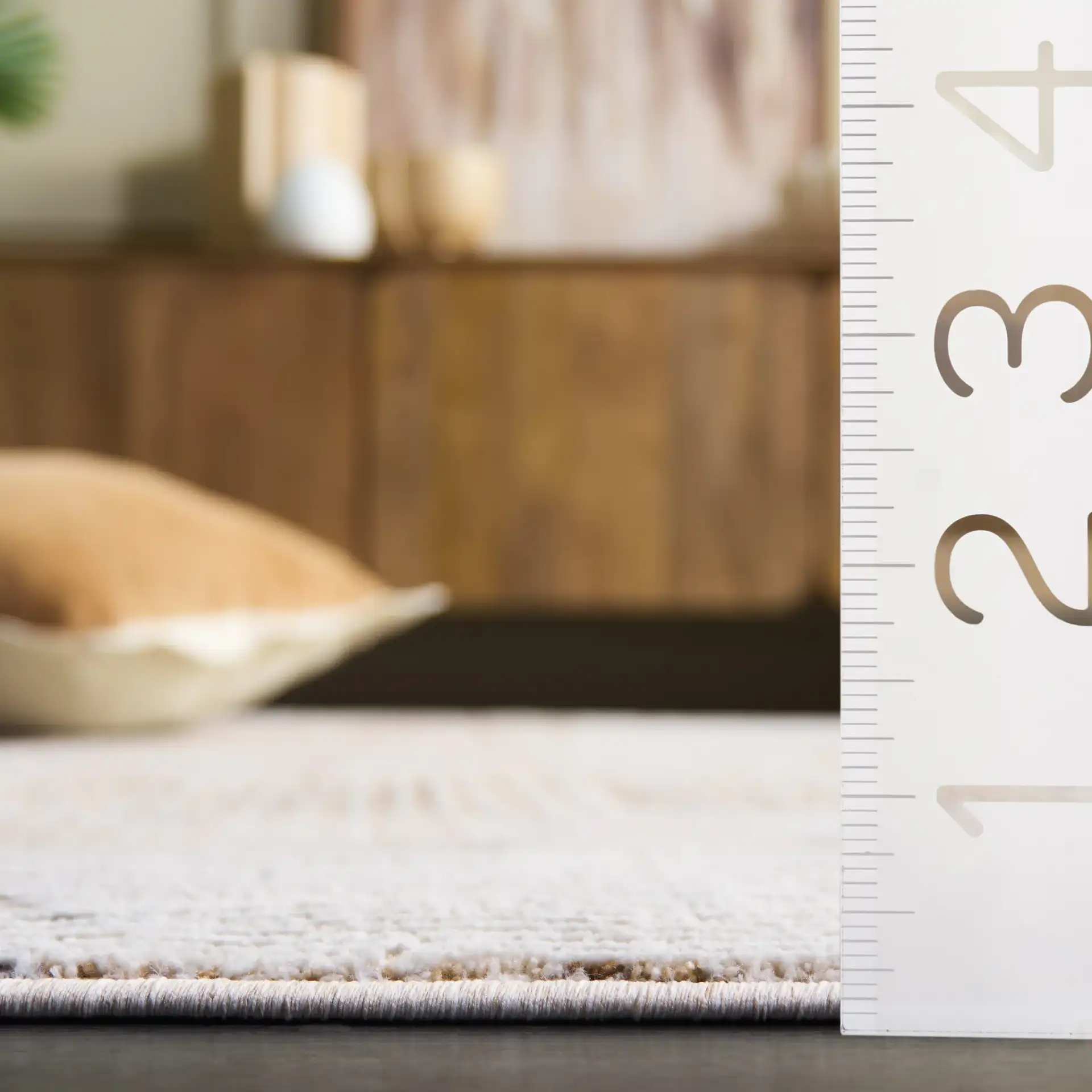 Finley Linear Patchwork Rug in Ivory / Beige in a styled room