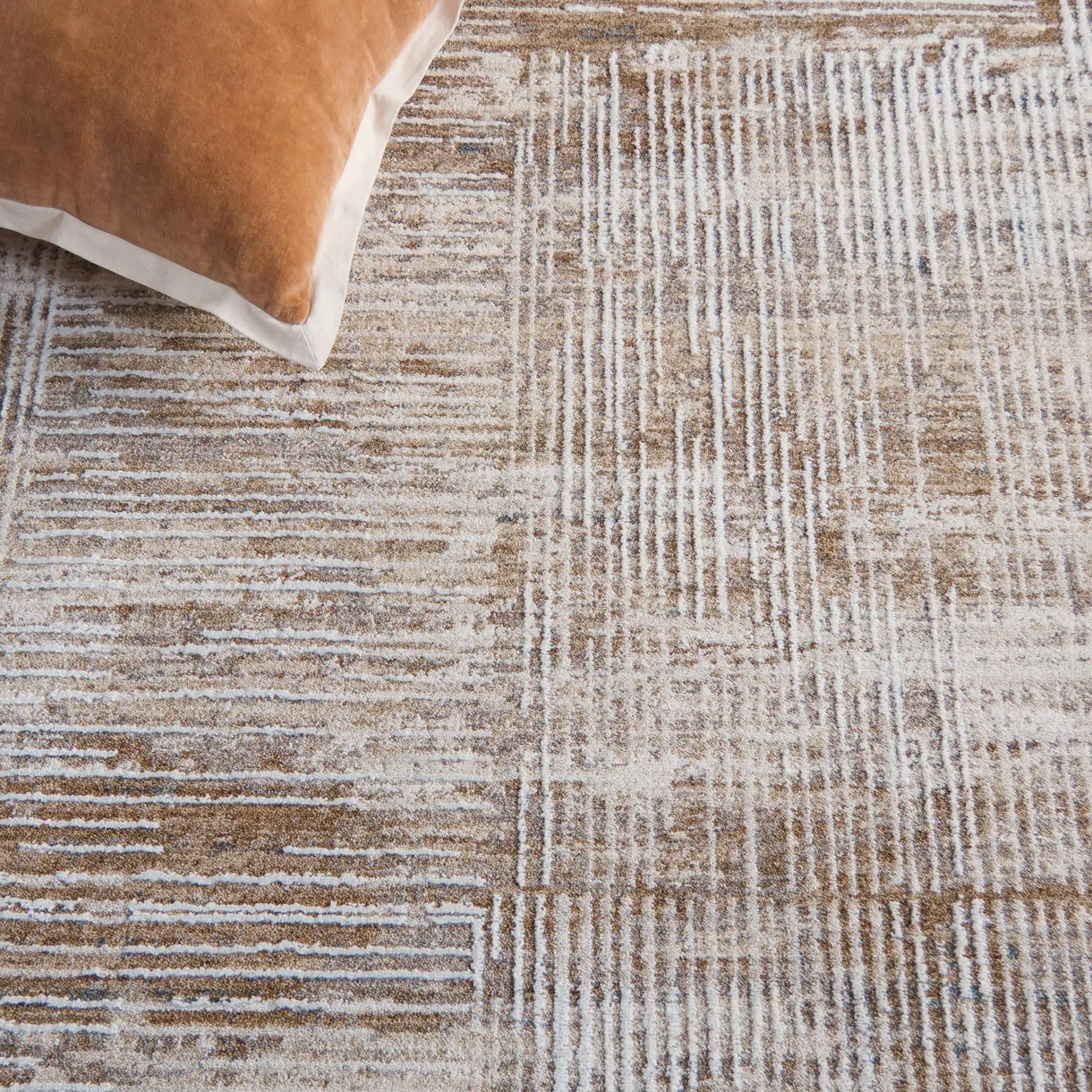 Finley Linear Patchwork Rug in Ivory / Beige in a styled room