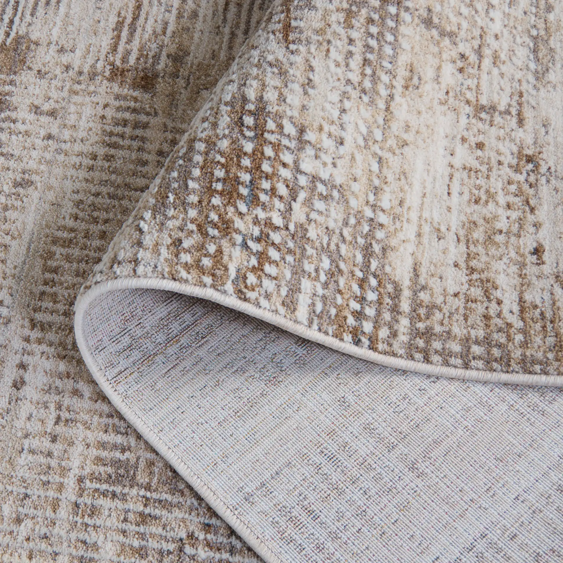 Finley Linear Patchwork Rug in Ivory / Beige in a styled room