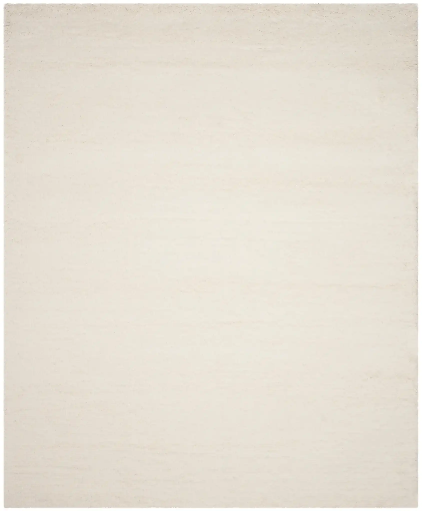 Flokati Solid Hand-Tufted Wool Shag Rug in Ivory