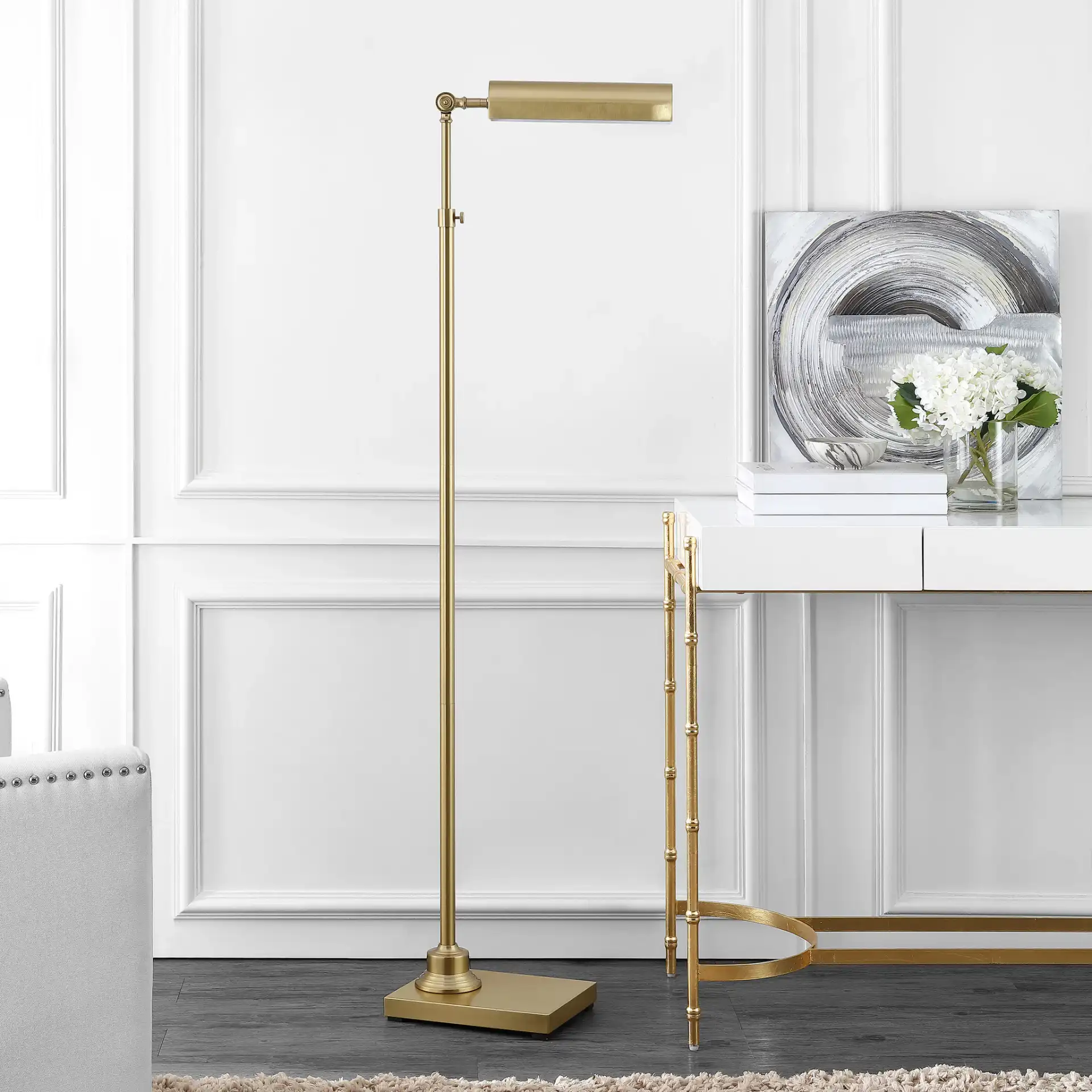 Renla Floor Lamp in Brass in a styled room