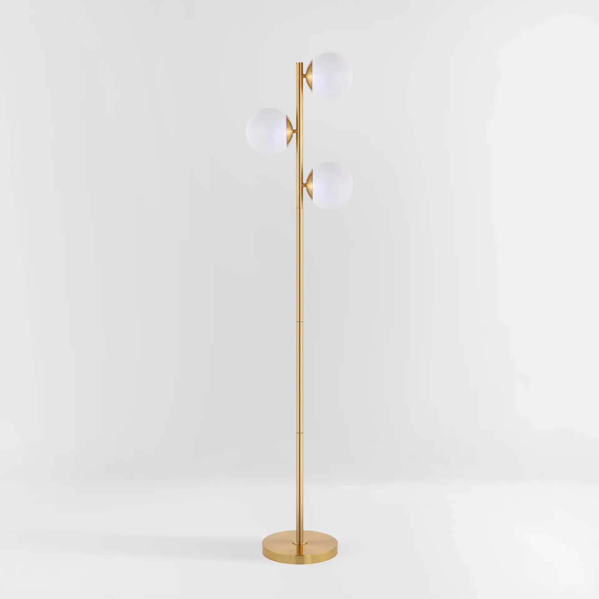 Devlyn Three-Light Floor Lamp in Gold, detail view