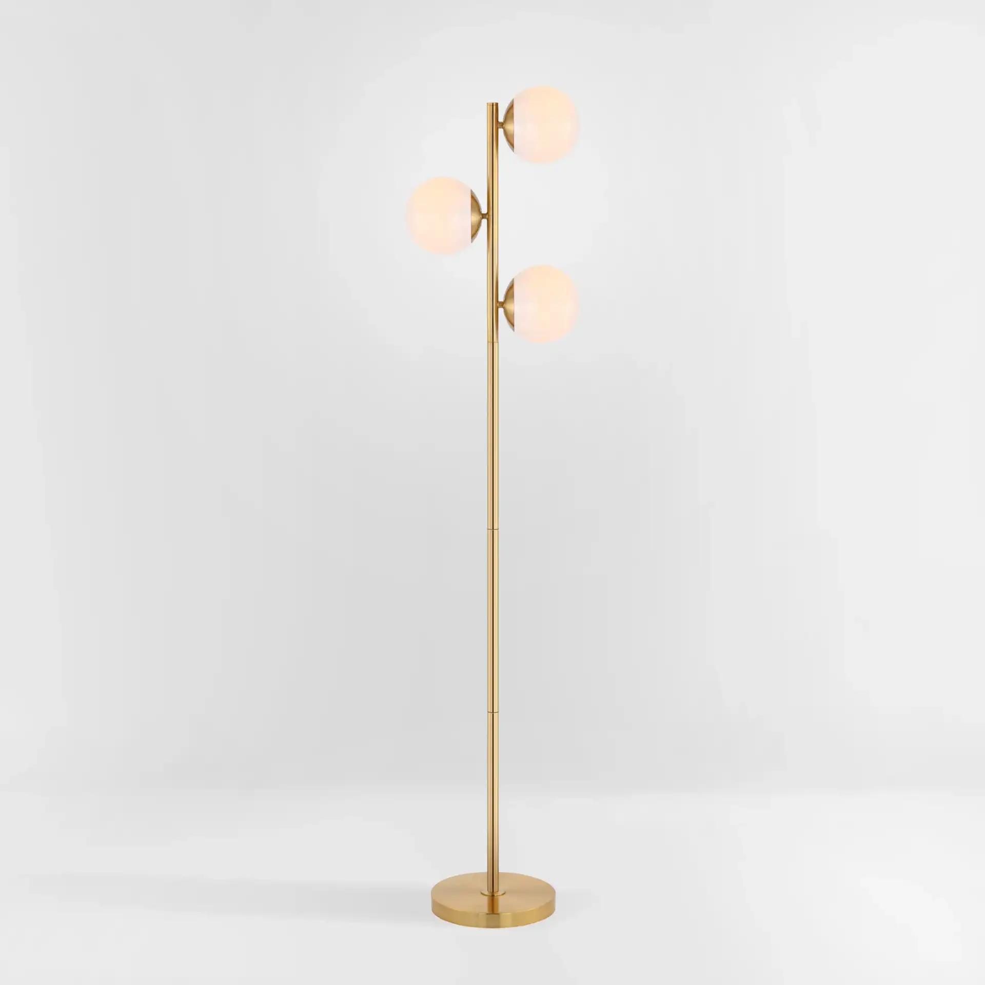 Devlyn Three-Light Floor Lamp in Gold, detail view