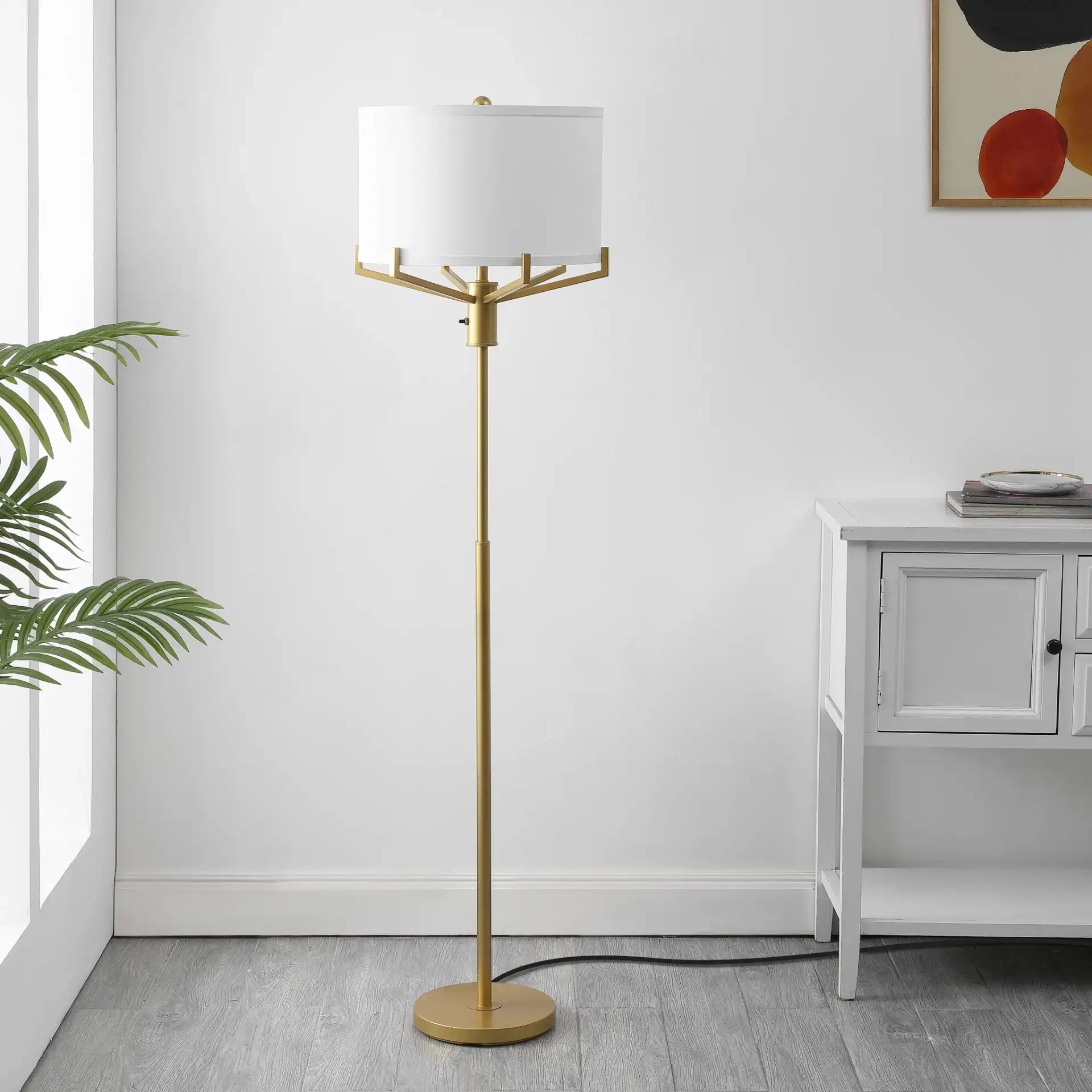 Elaria Floor Lamp in Gold in a styled room