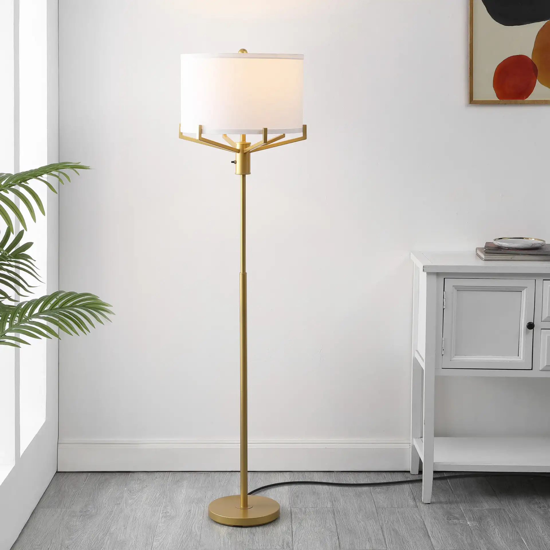 Elaria Floor Lamp in Gold in a styled room