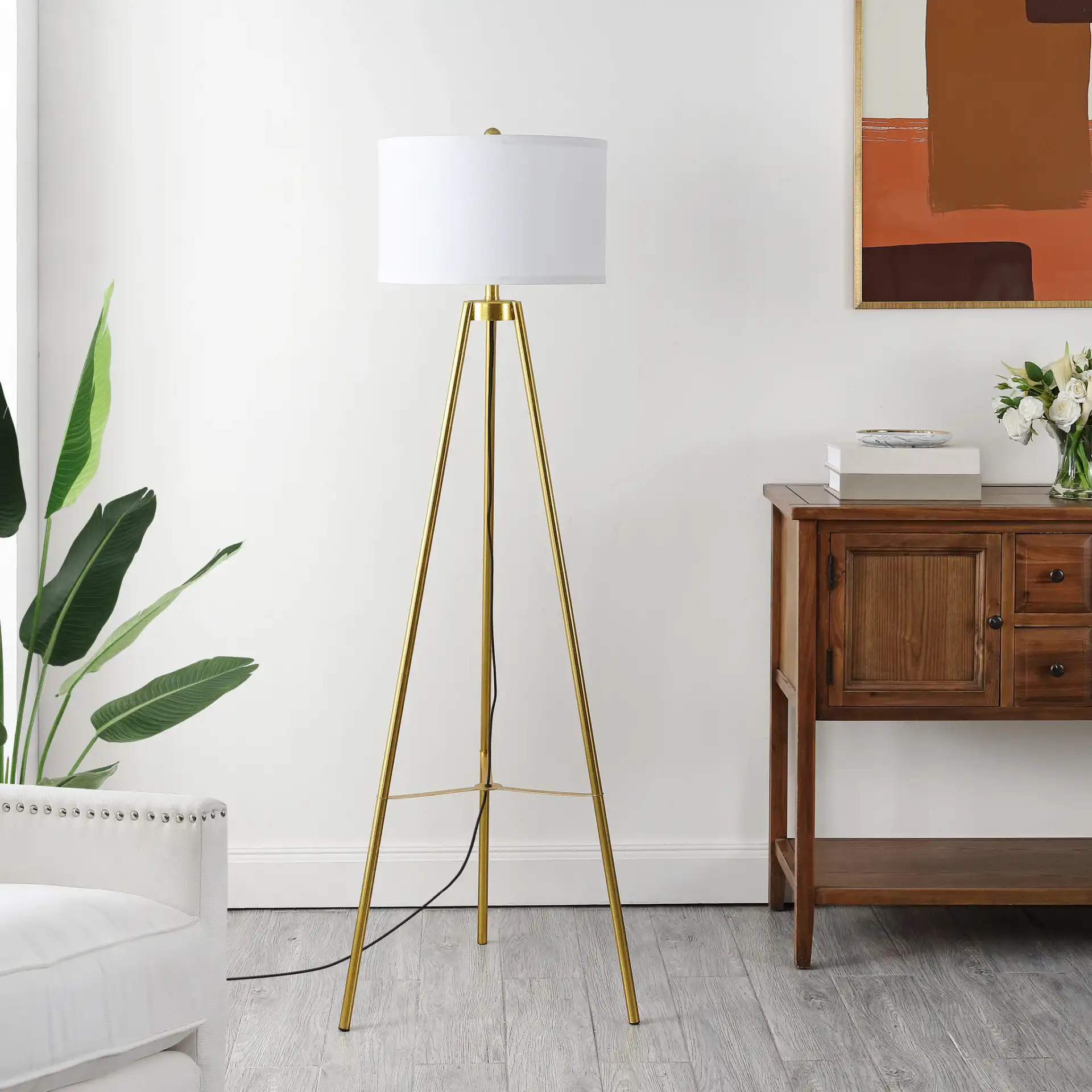 Falco Floor Lamp in Gold in a styled room