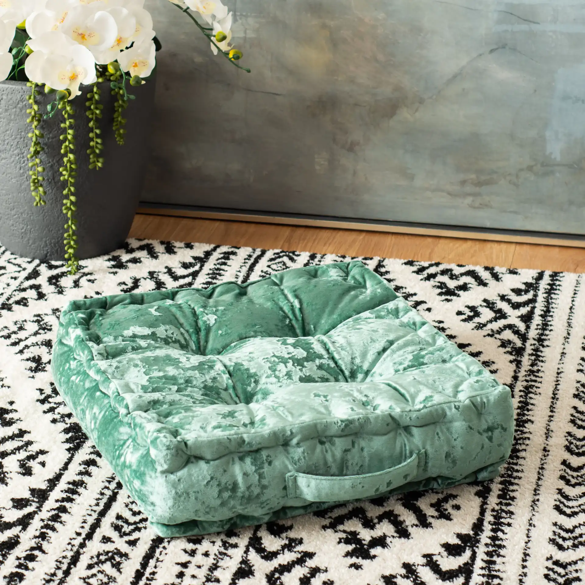 Peony Floor Pillow in White in a styled room