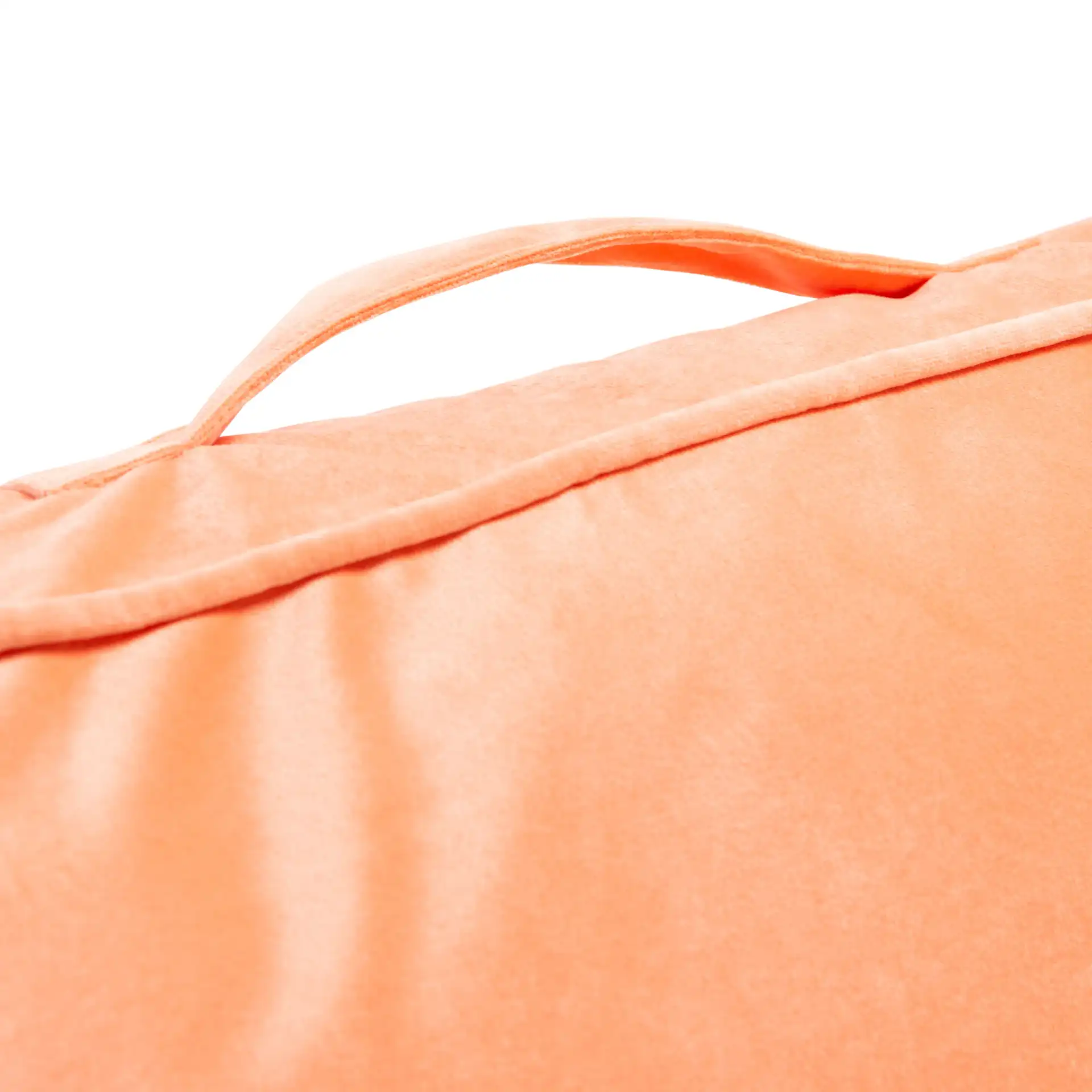 Dulcie Floor Pillow in Peach in a styled room