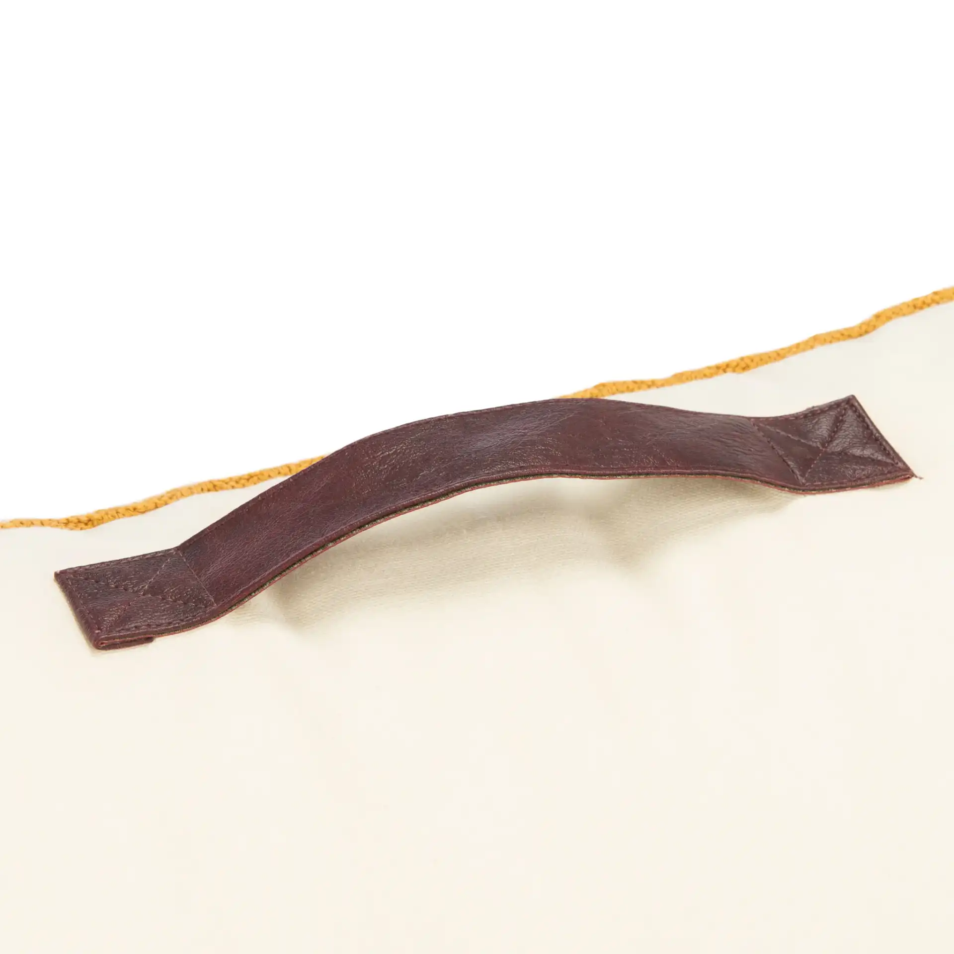 Nyssa Floor Pillow in Mustard / Beige in a styled room