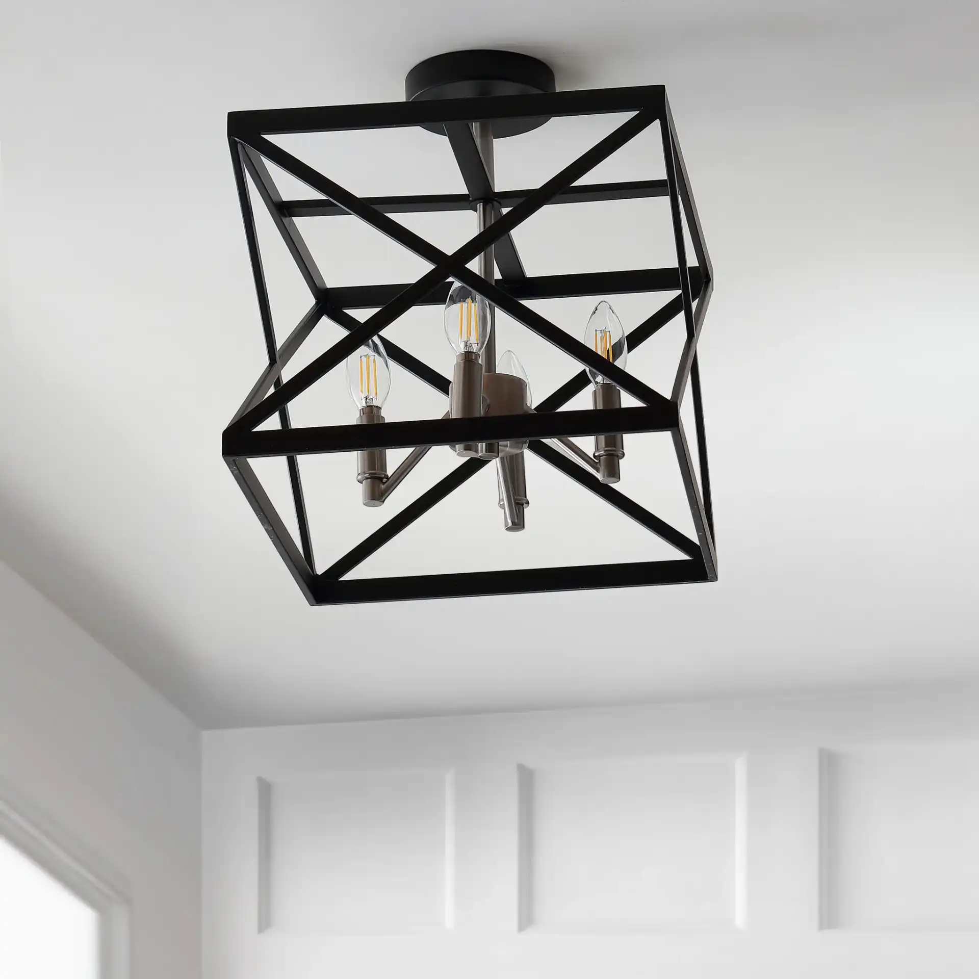 Matias Flush Mount in Black in a styled room