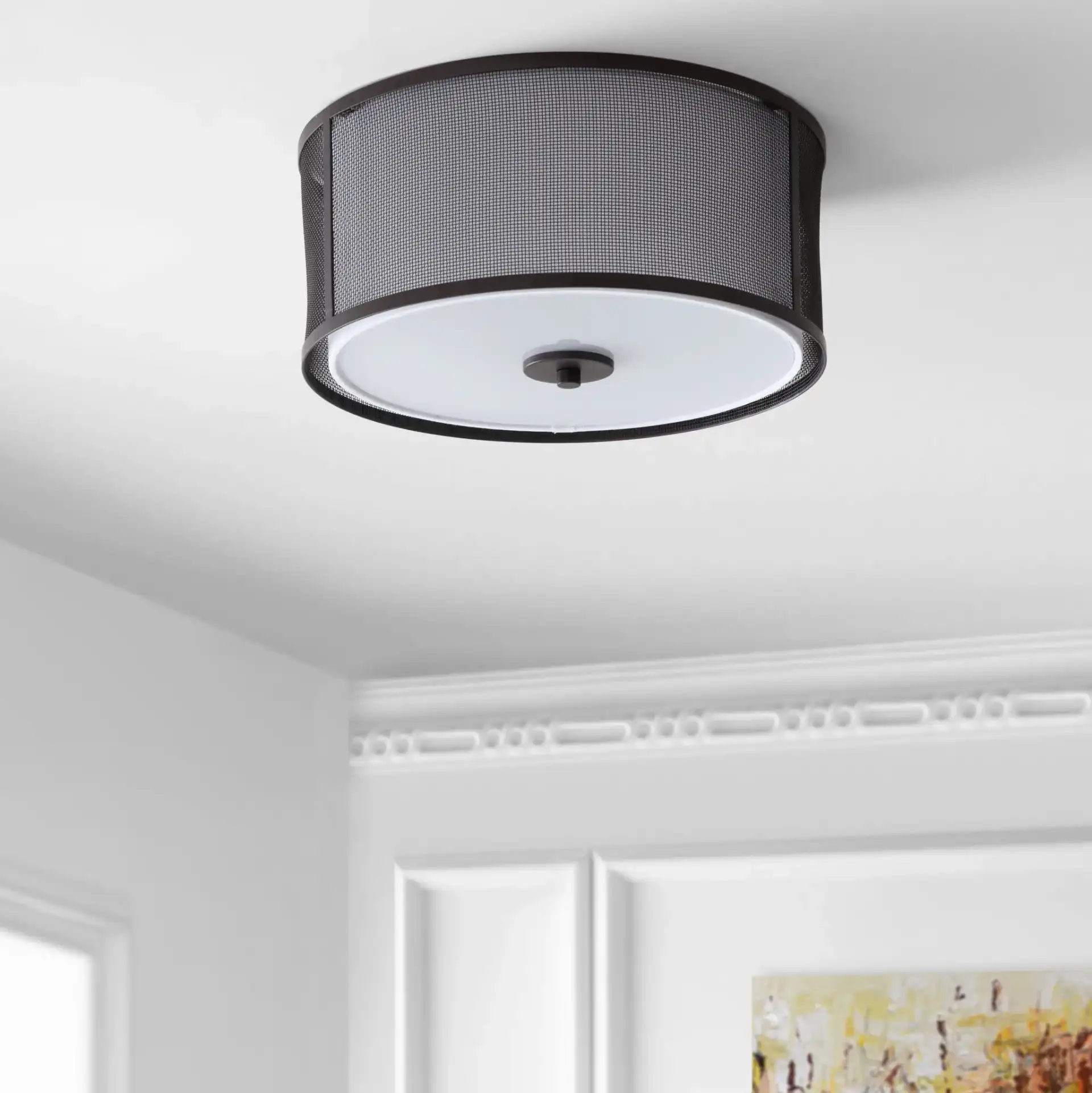 Layne Flush Mount in Brass in a styled room