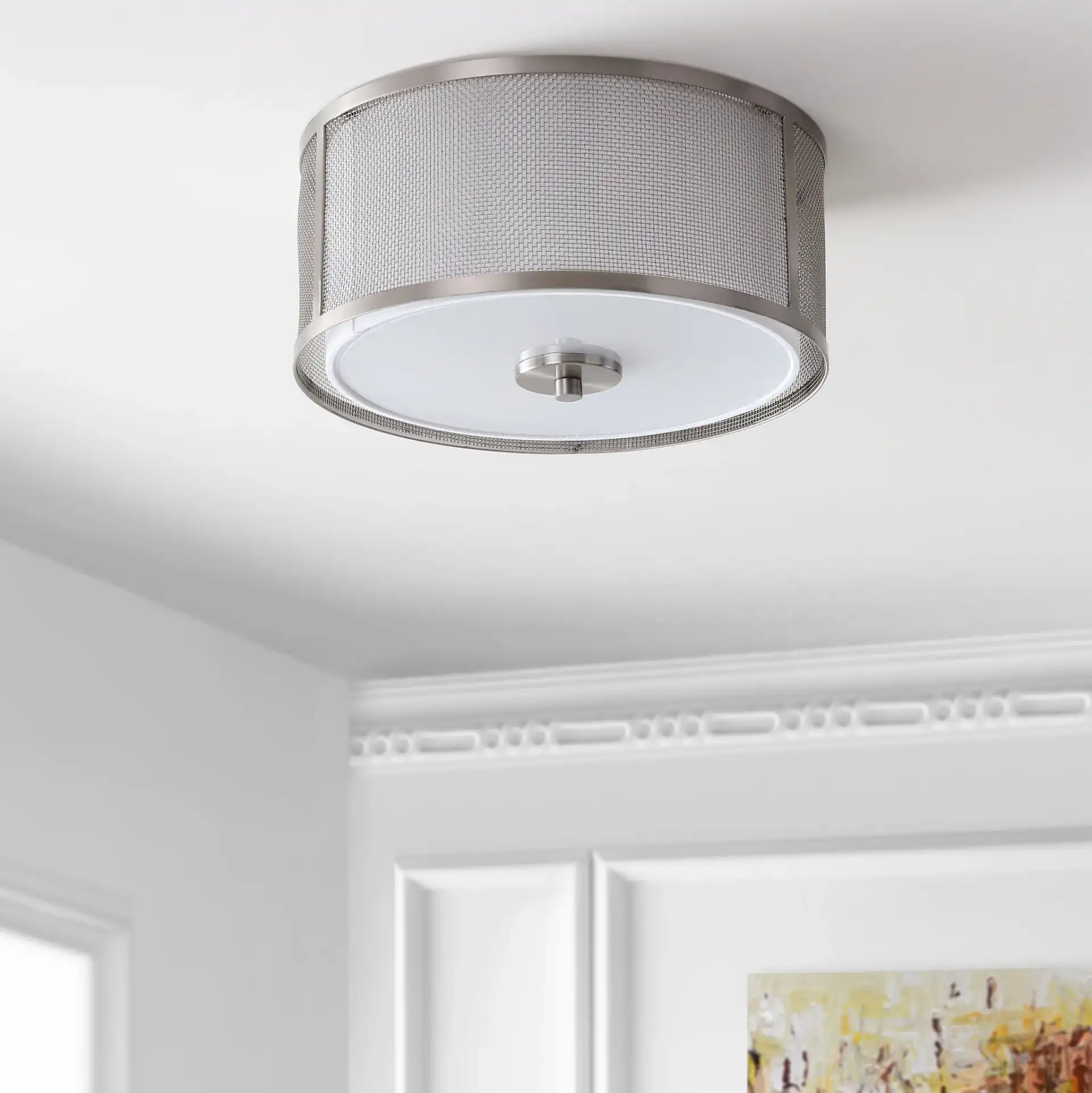 Layne Flush Mount in Bronze in a styled room