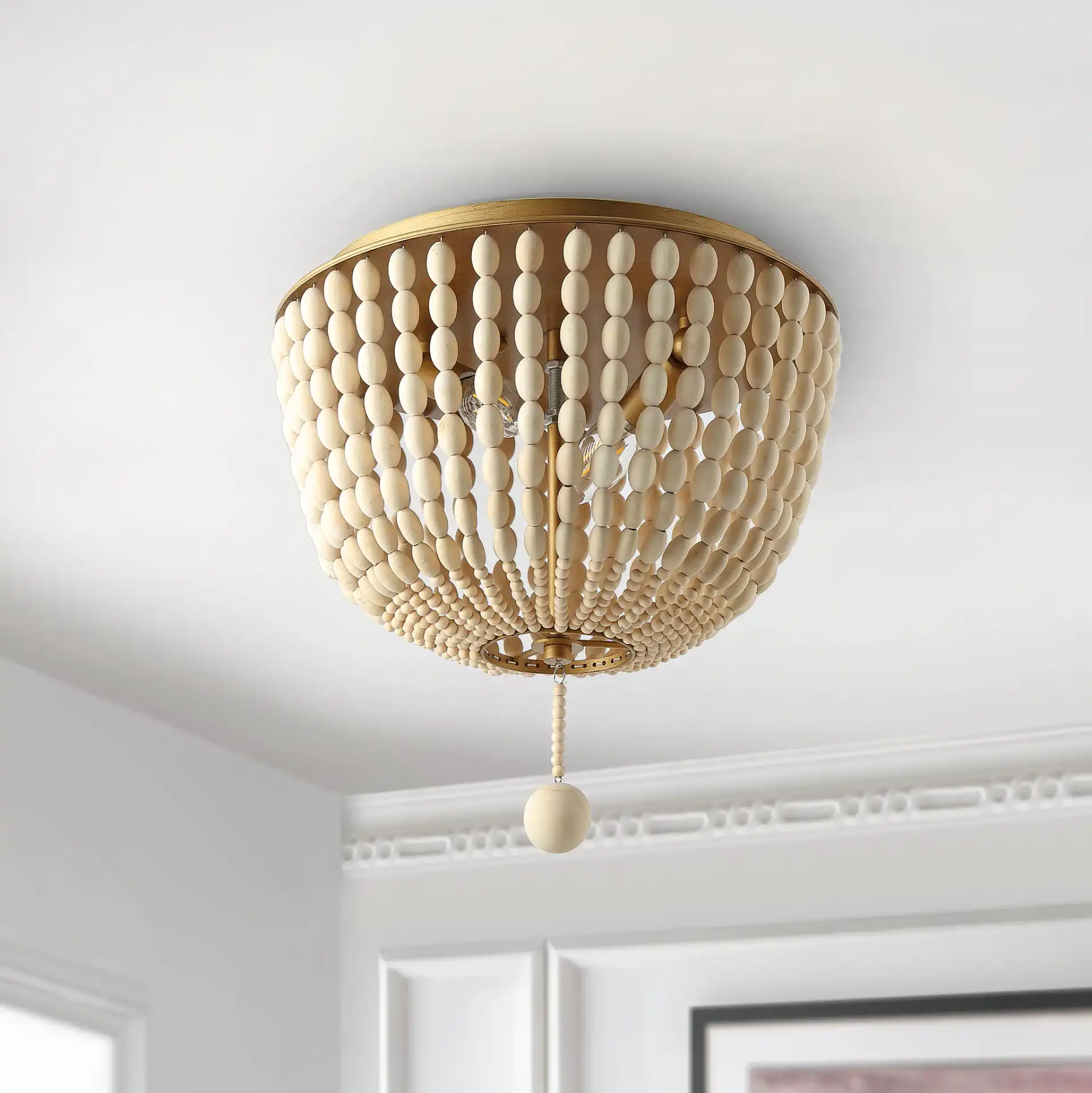 Loris Two-Light Flush Mount in Cream in a styled room