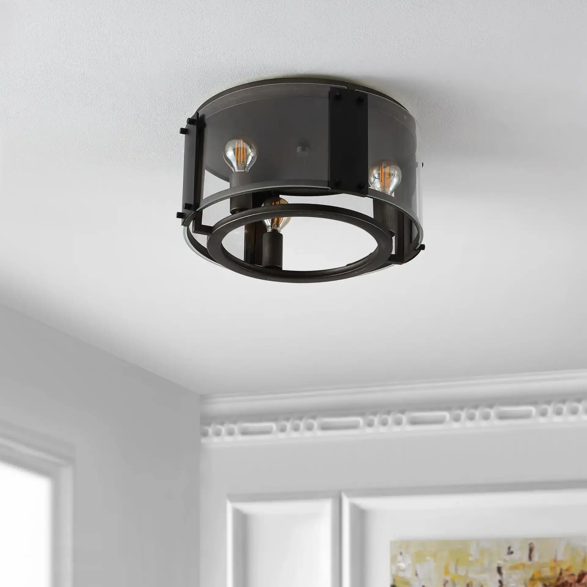 Olen Flush Mount in Chrome / Black in a styled room