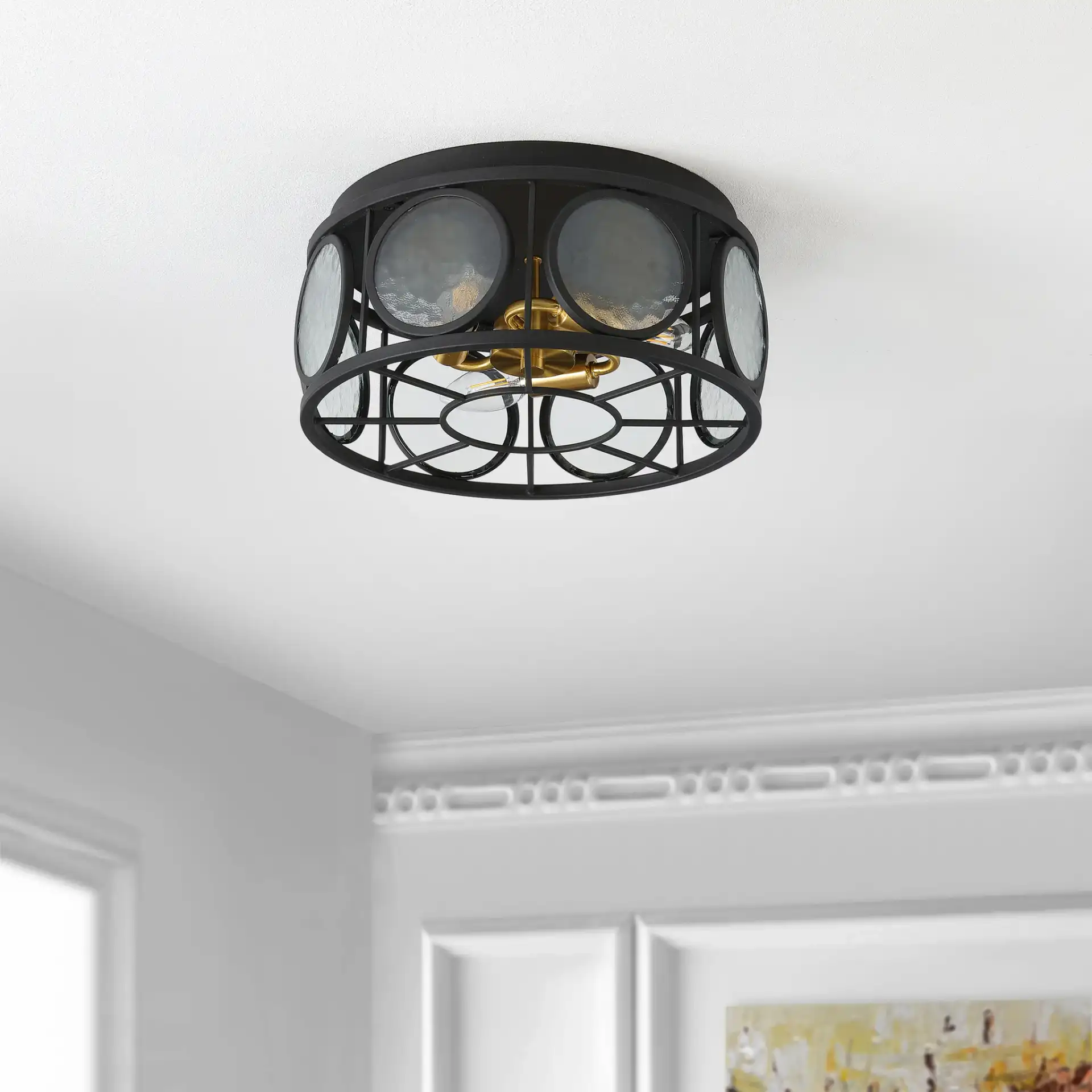 Ander Three-Light Flush Mount in Black in a styled room