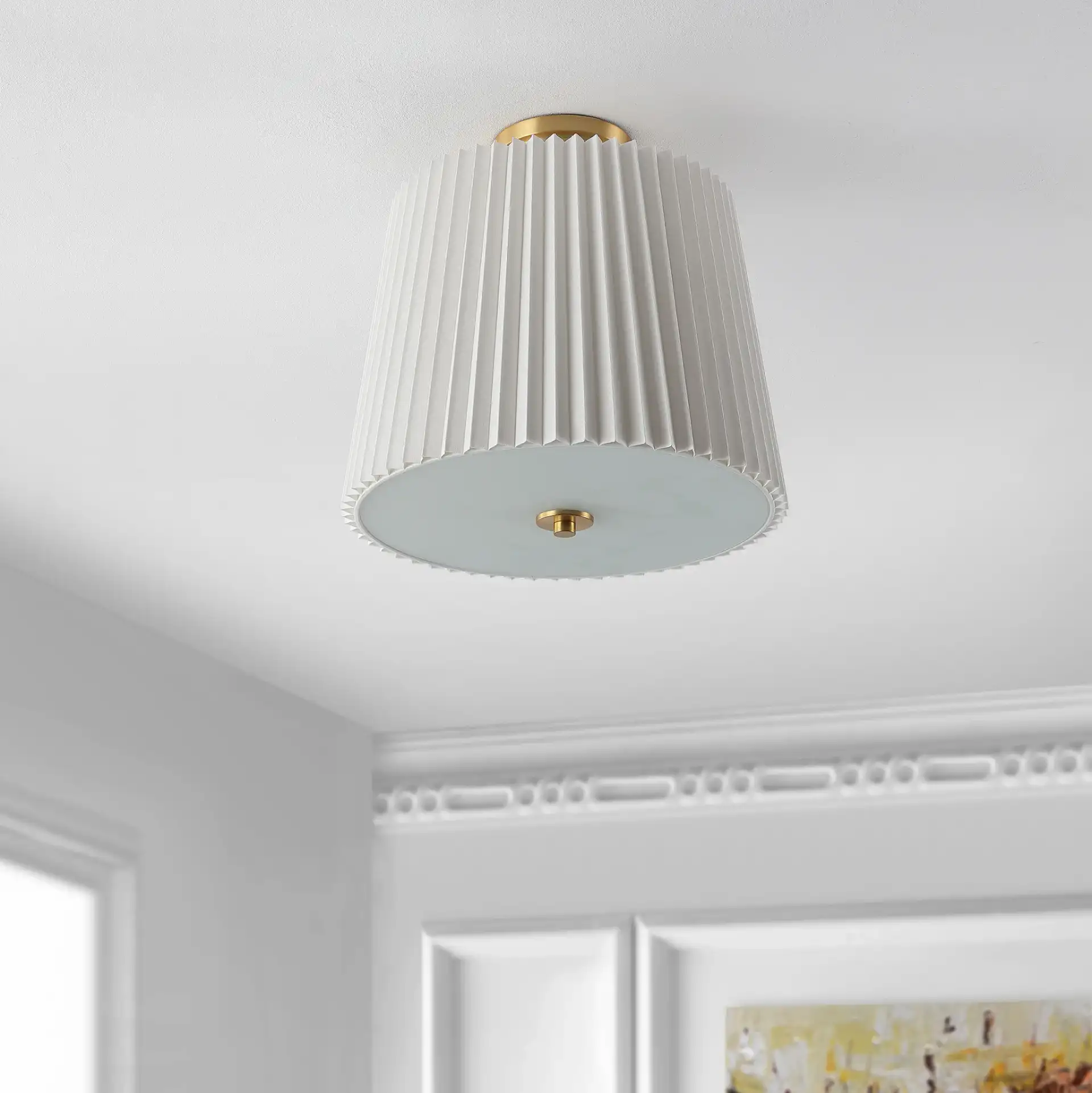 Madio Three-Light Flush Mount in White / Gold in a styled room