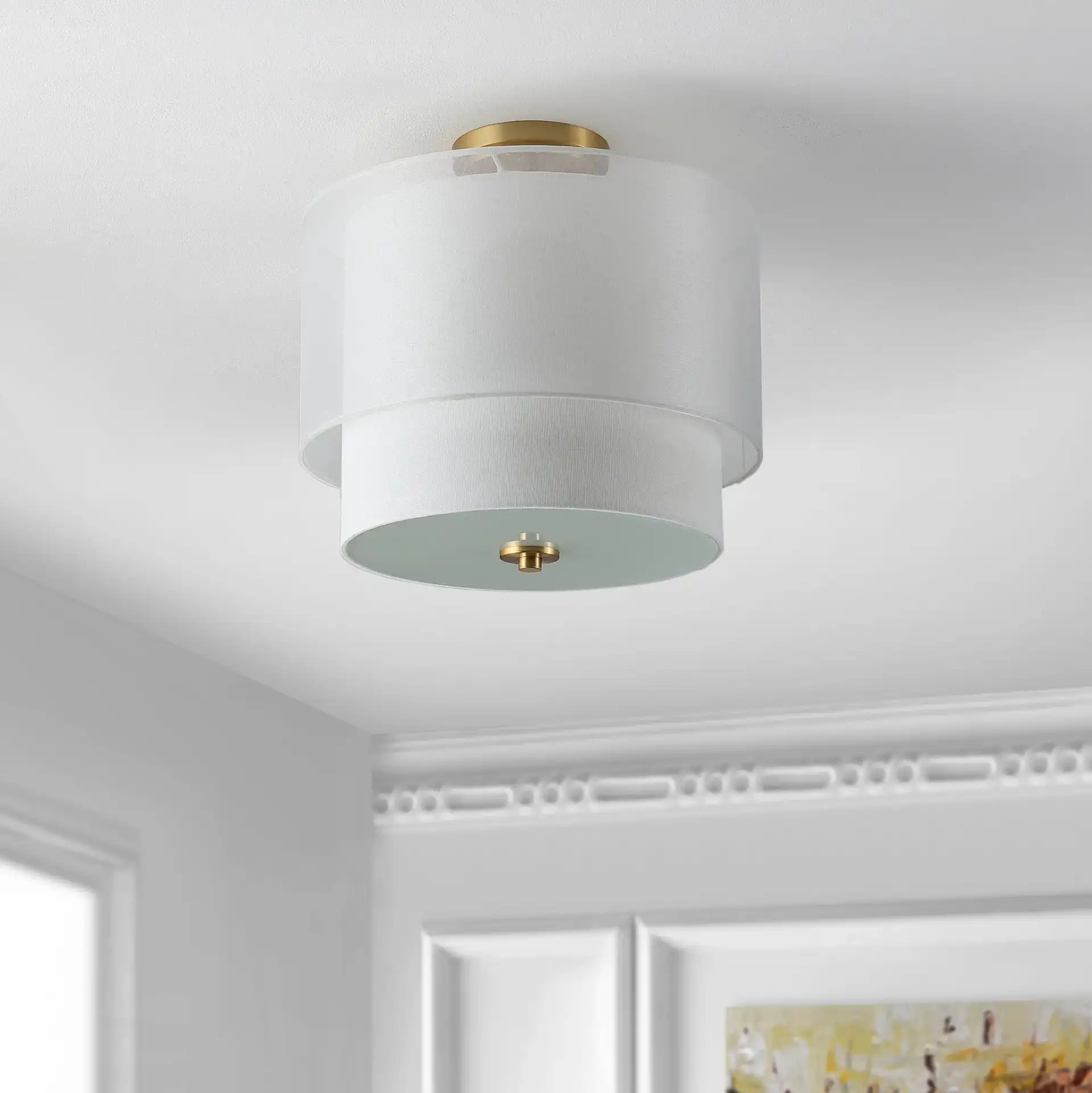 Namida Flush Mount in White / Gold in a styled room