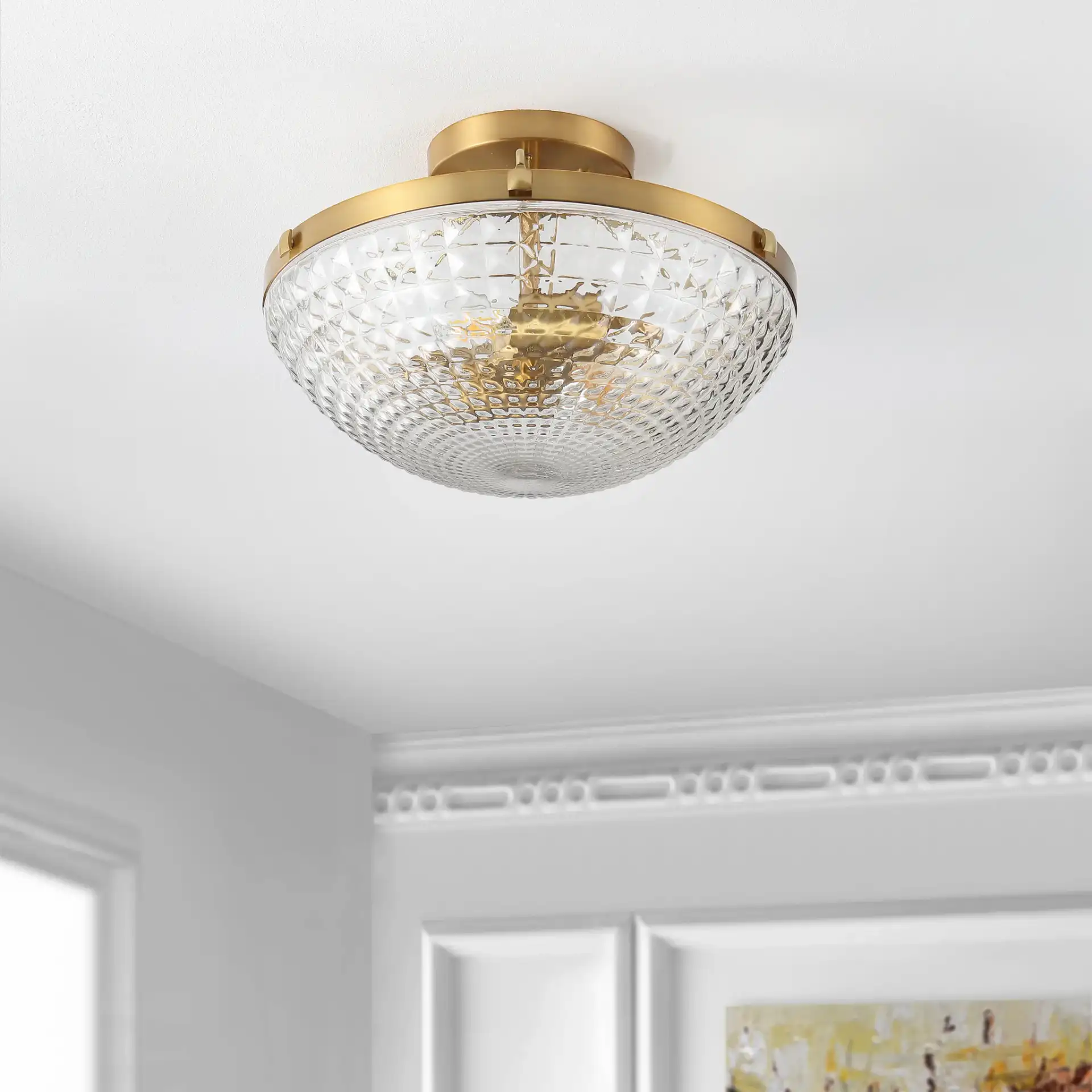 Nienna Two-Light Flush Mount in Clear / Gold in a styled room