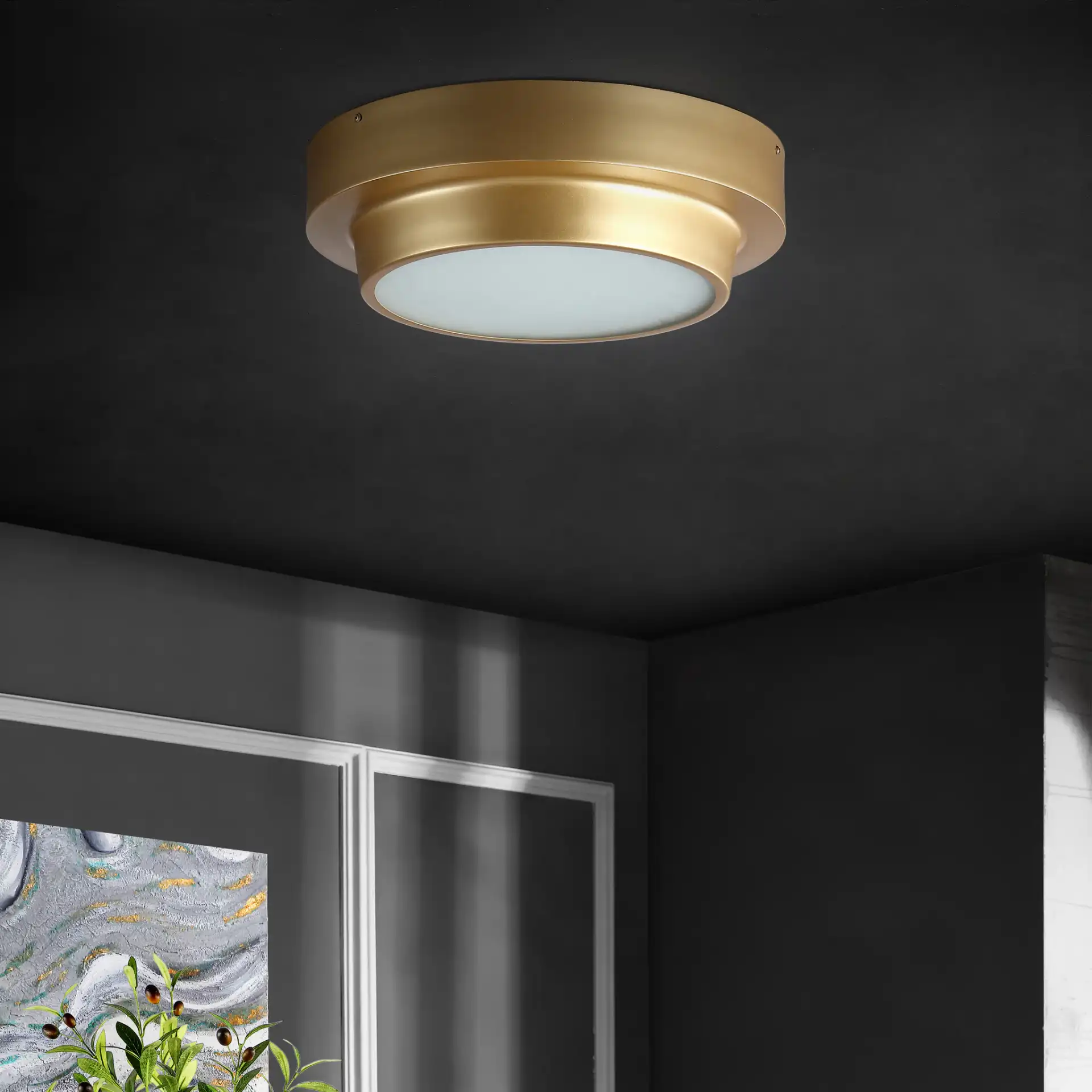 Laius Two-Light Flush Mount in Gold in a styled room
