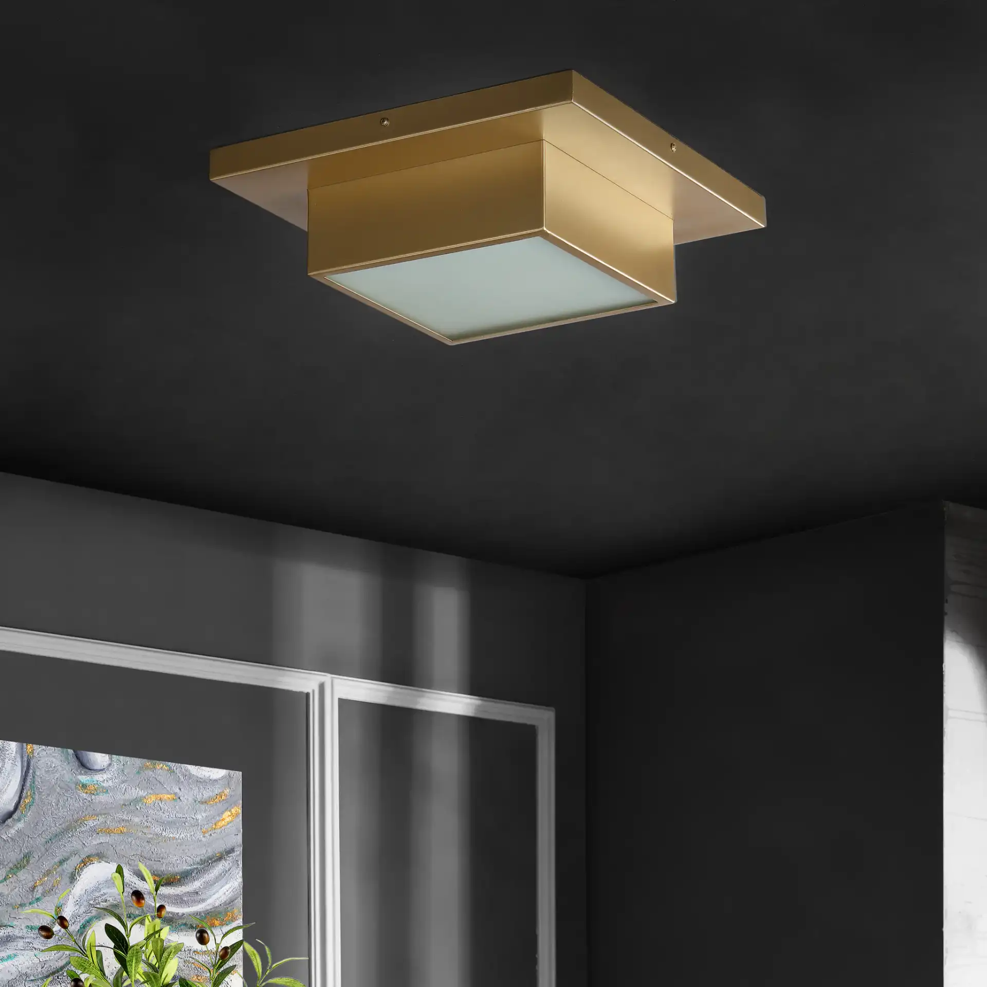 Kylin Two-Light Flush Mount in Gold in a styled room