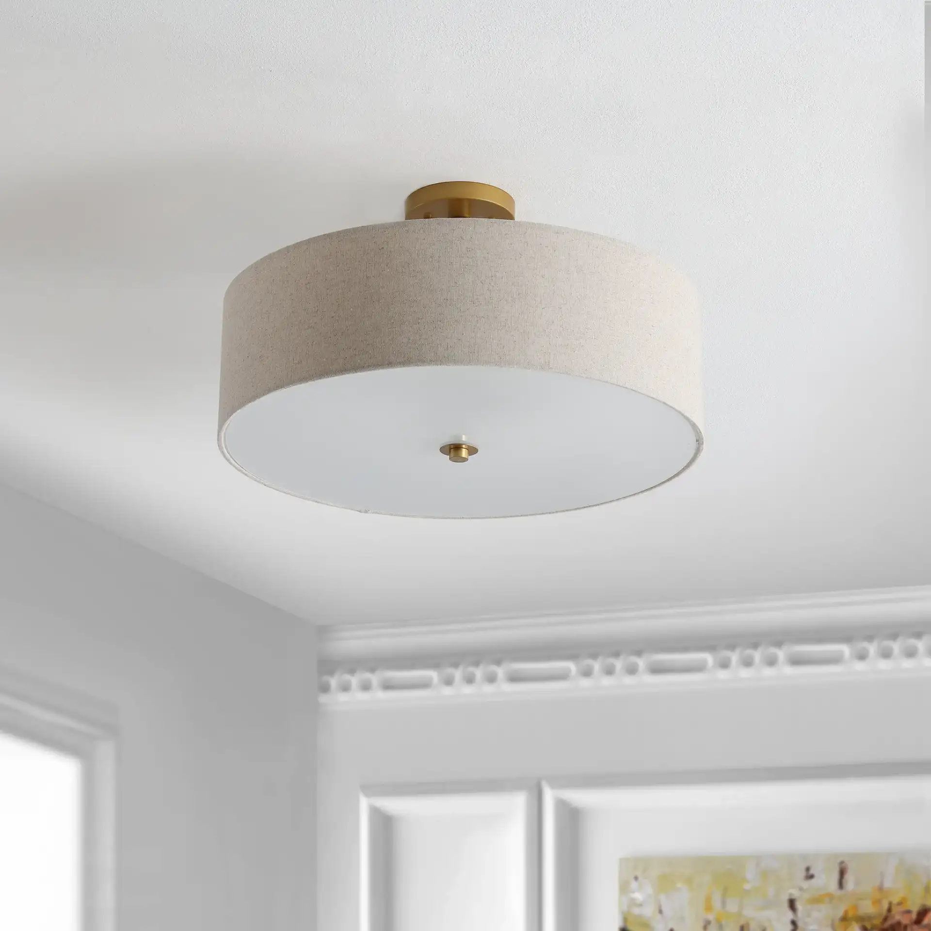 Jolana Three-Light Flush Mount in Oatmeal / Gold in a styled room