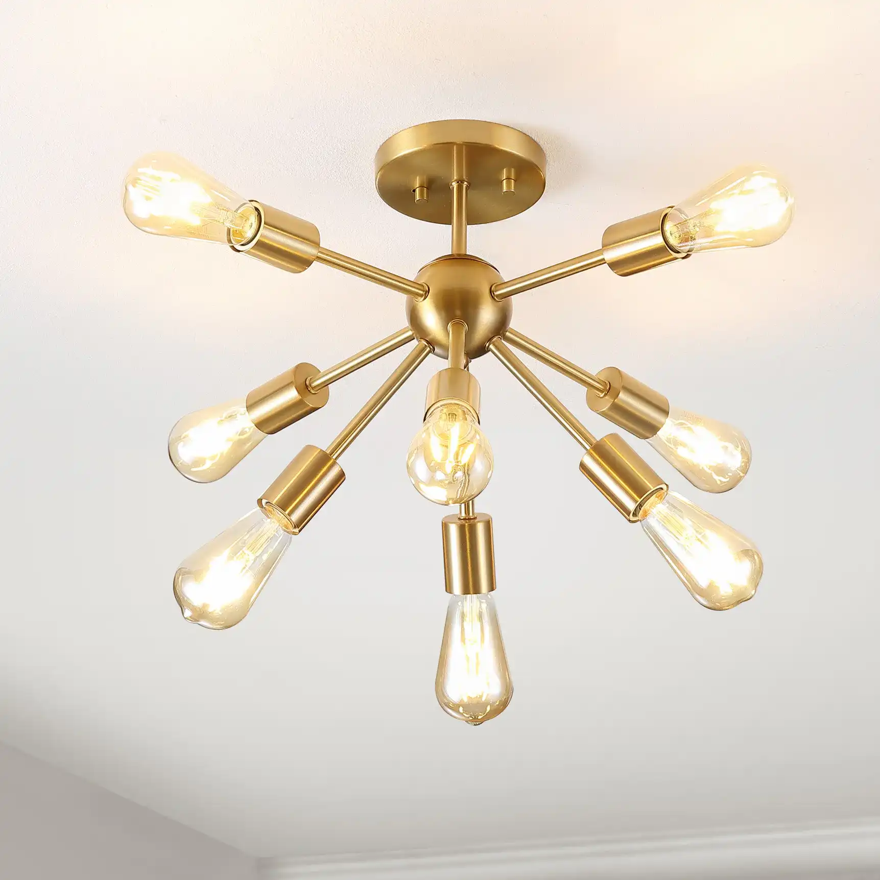 Gannet Eight-Light Flush Mount in Brass in a styled room
