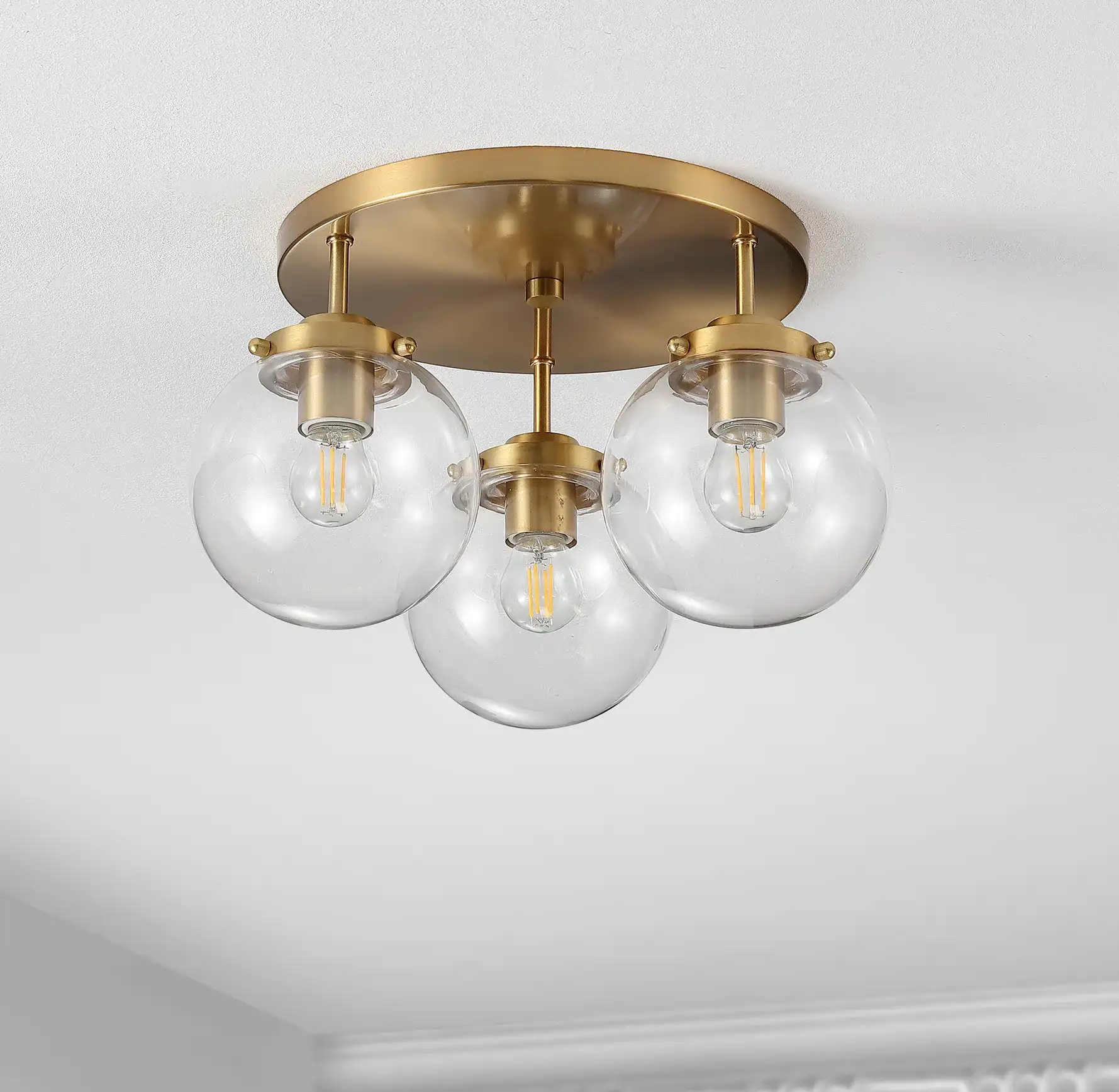 Ginesta Three-Light Flush Mount in Gold / Clear, detail view