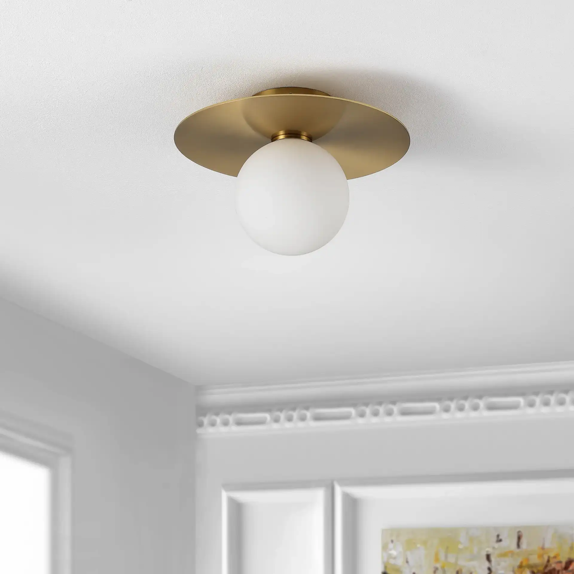 Finlay Flush Mount in Gold in a styled room