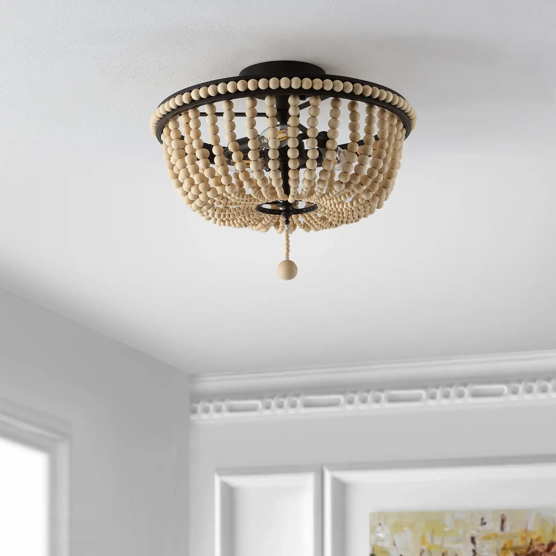 Cascina Three-Light Flush Mount in Natural / Bronze in a styled room