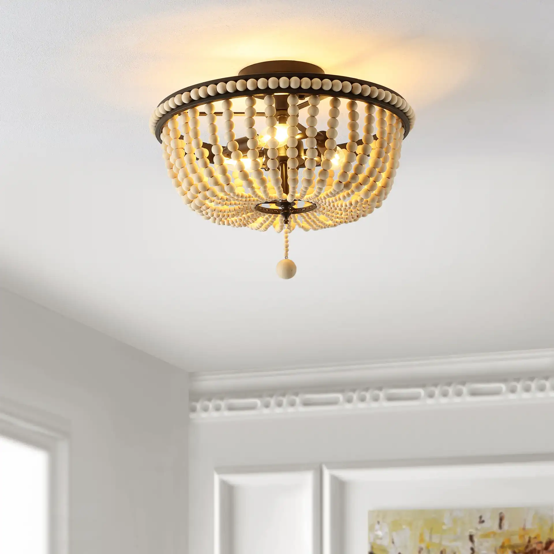 Cascina Three-Light Flush Mount in Natural / Bronze in a styled room