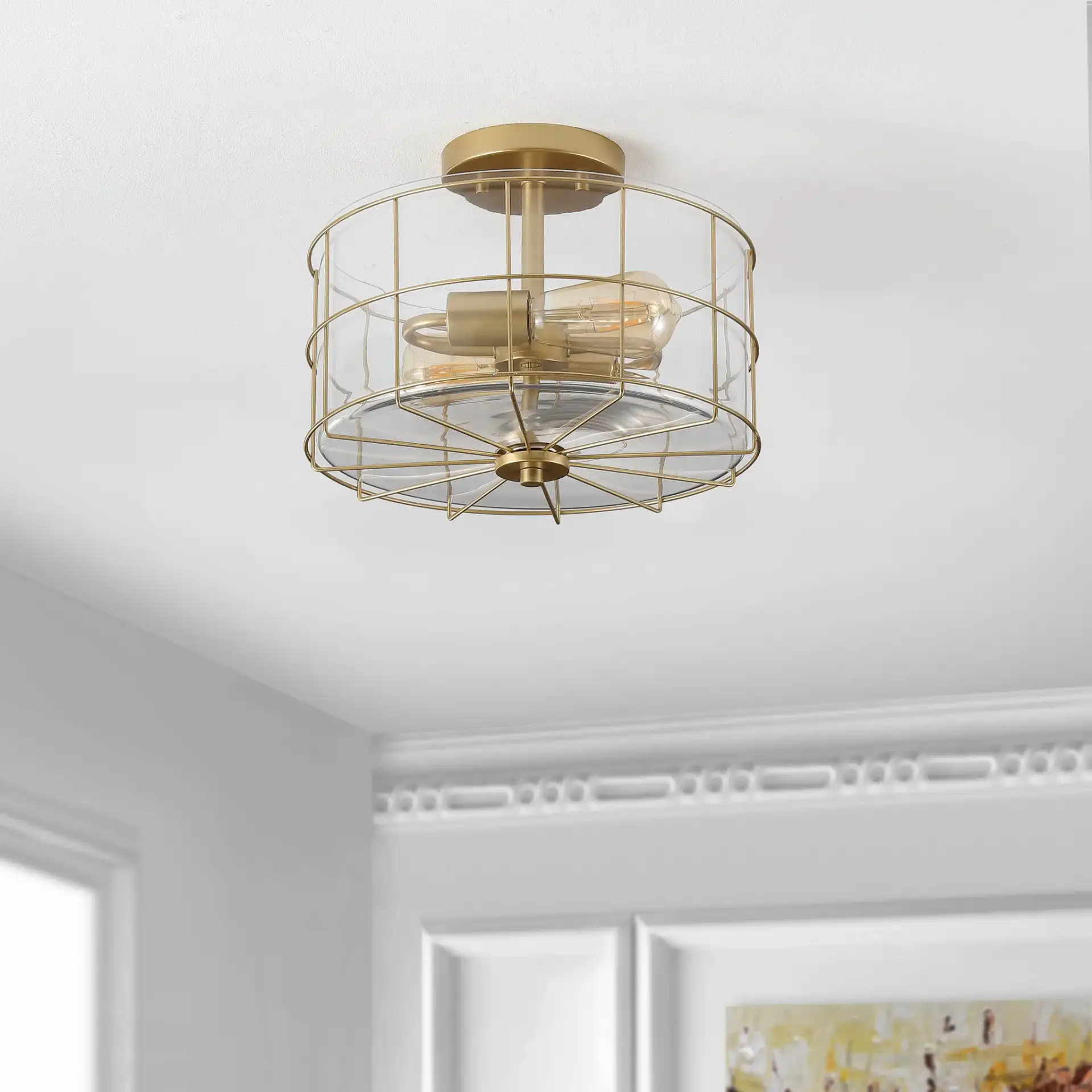 Hannes Two-Light Flush Mount in Brass in a styled room
