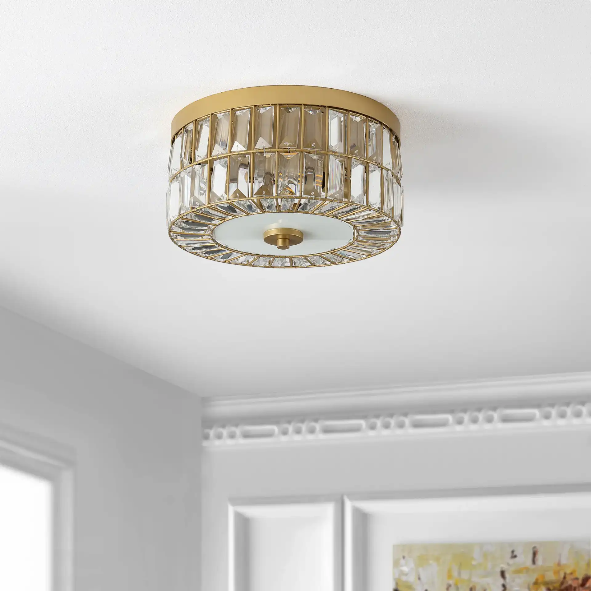 Parda Three-Light Flush Mount in Brass in a styled room