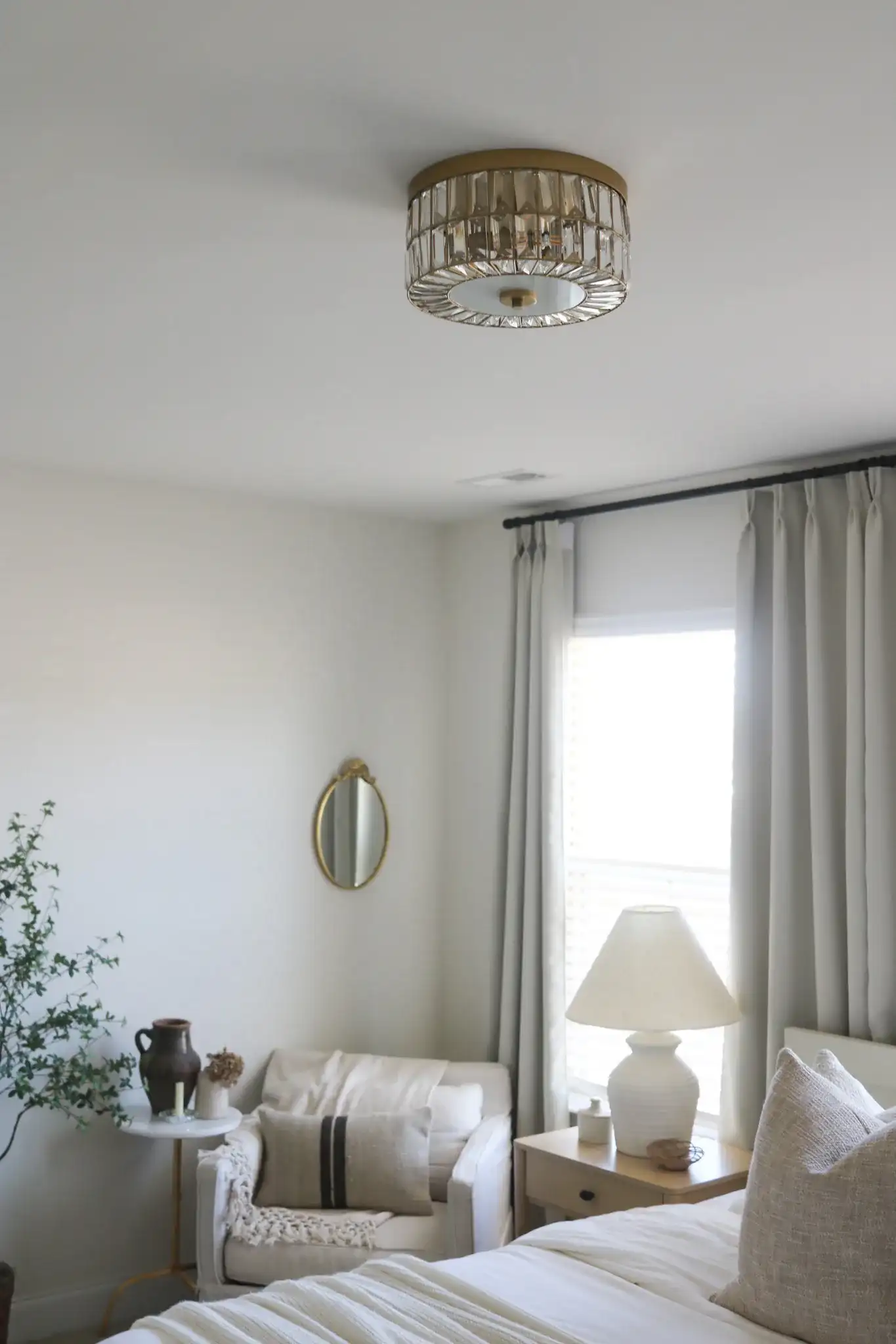 Parda Three-Light Flush Mount in Brass in a styled room