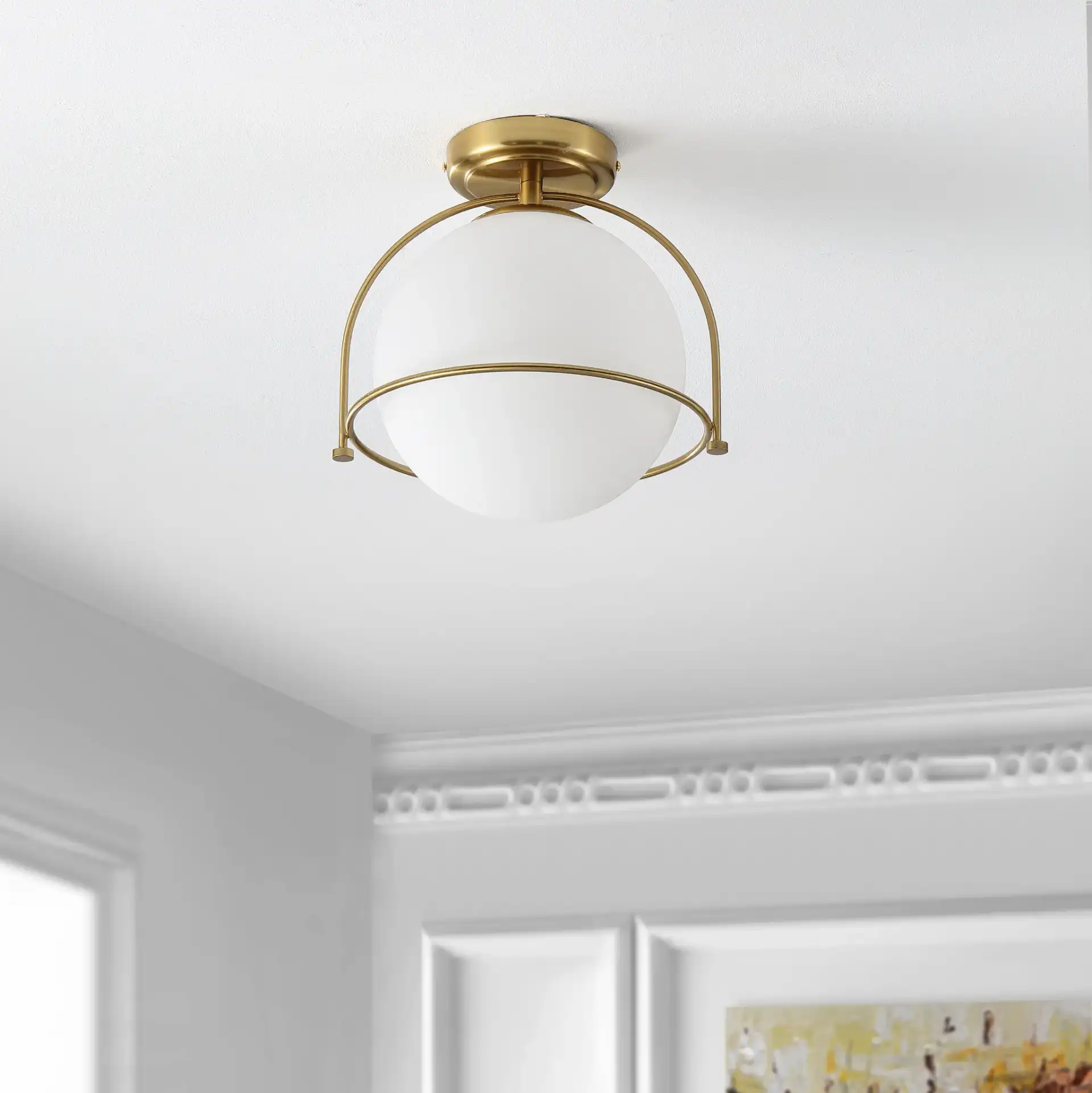 Valise Flush Mount in Gold / White in a styled room