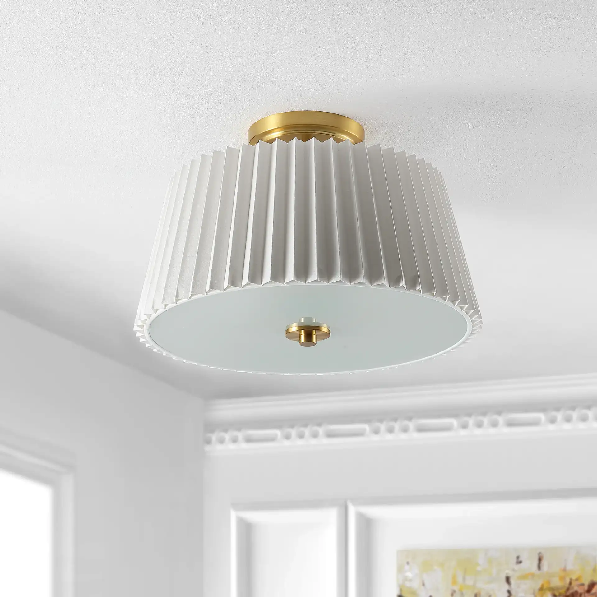 Larlon Three-Light Flush Mount in White / Gold in a styled room