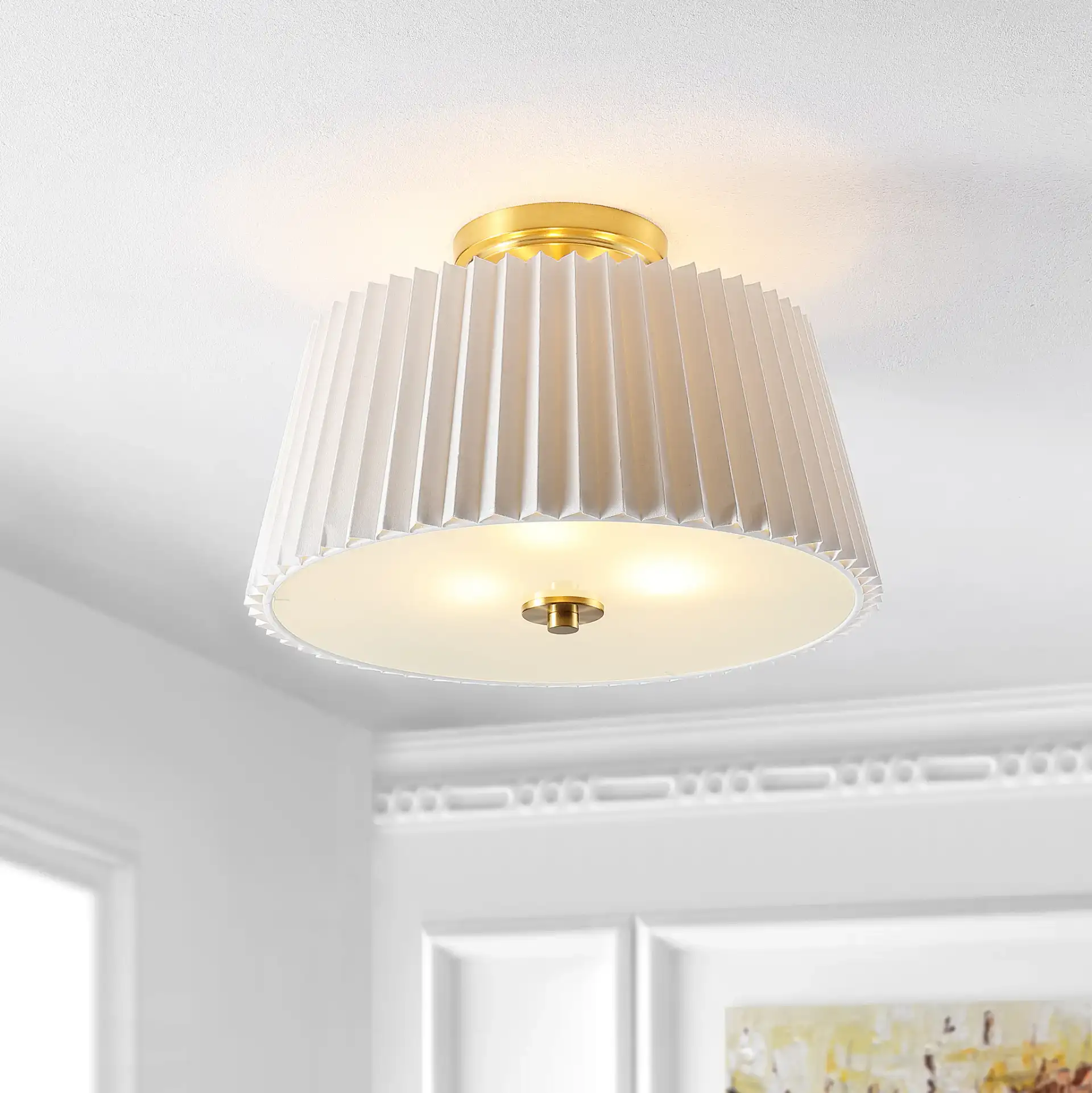 Larlon Three-Light Flush Mount in White / Gold in a styled room