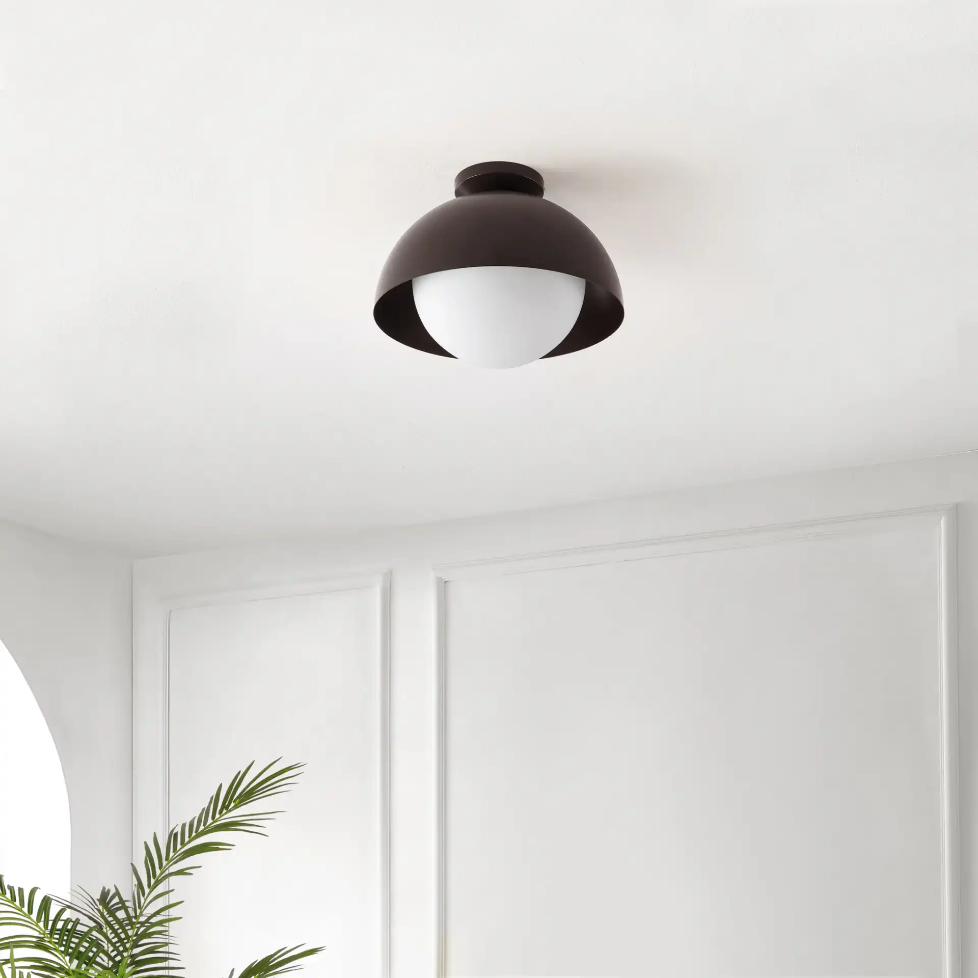 Syluna Flush Mount in Oil Rub Bronze / White in a styled room