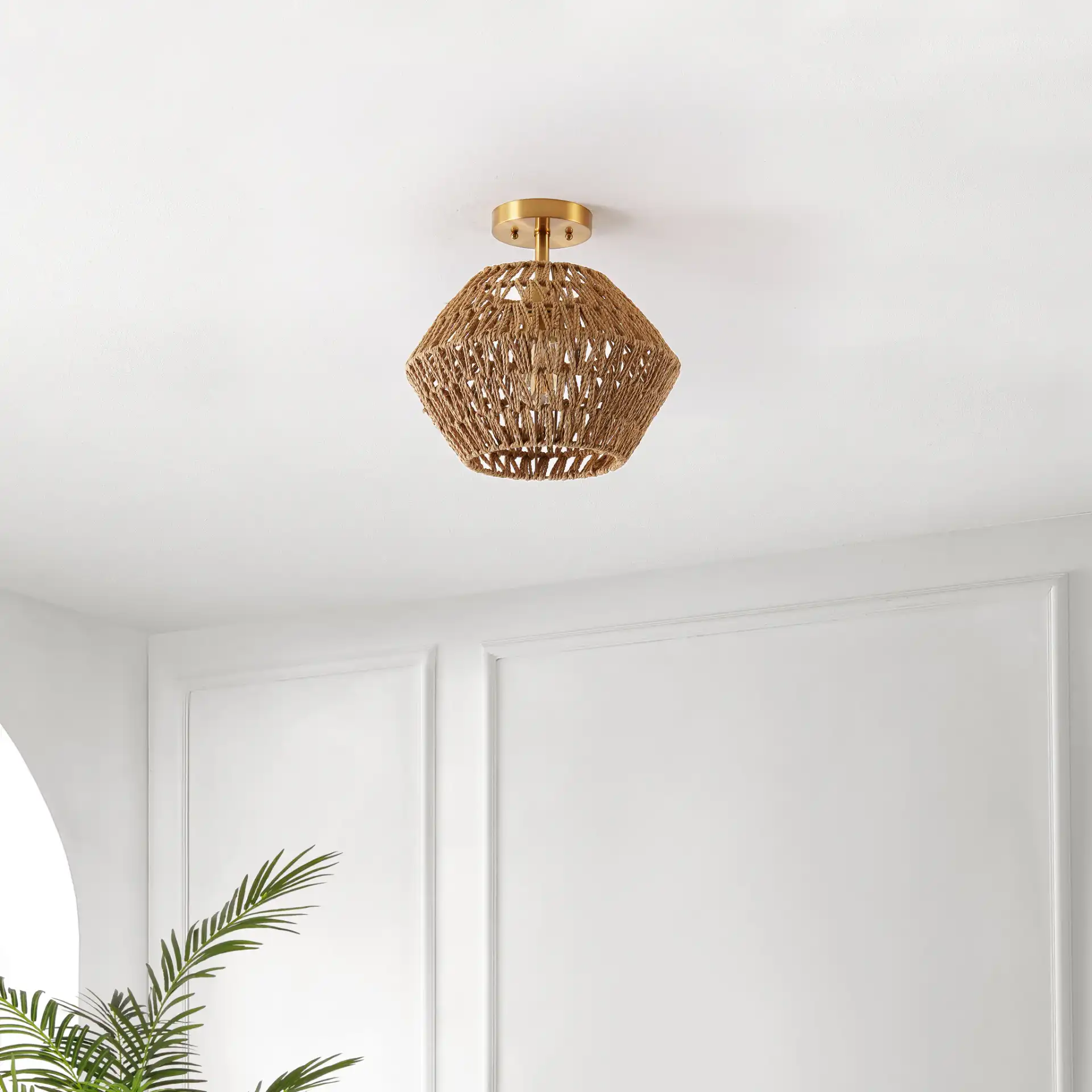 Raja Flush Mount in Natural / Gold in a styled room