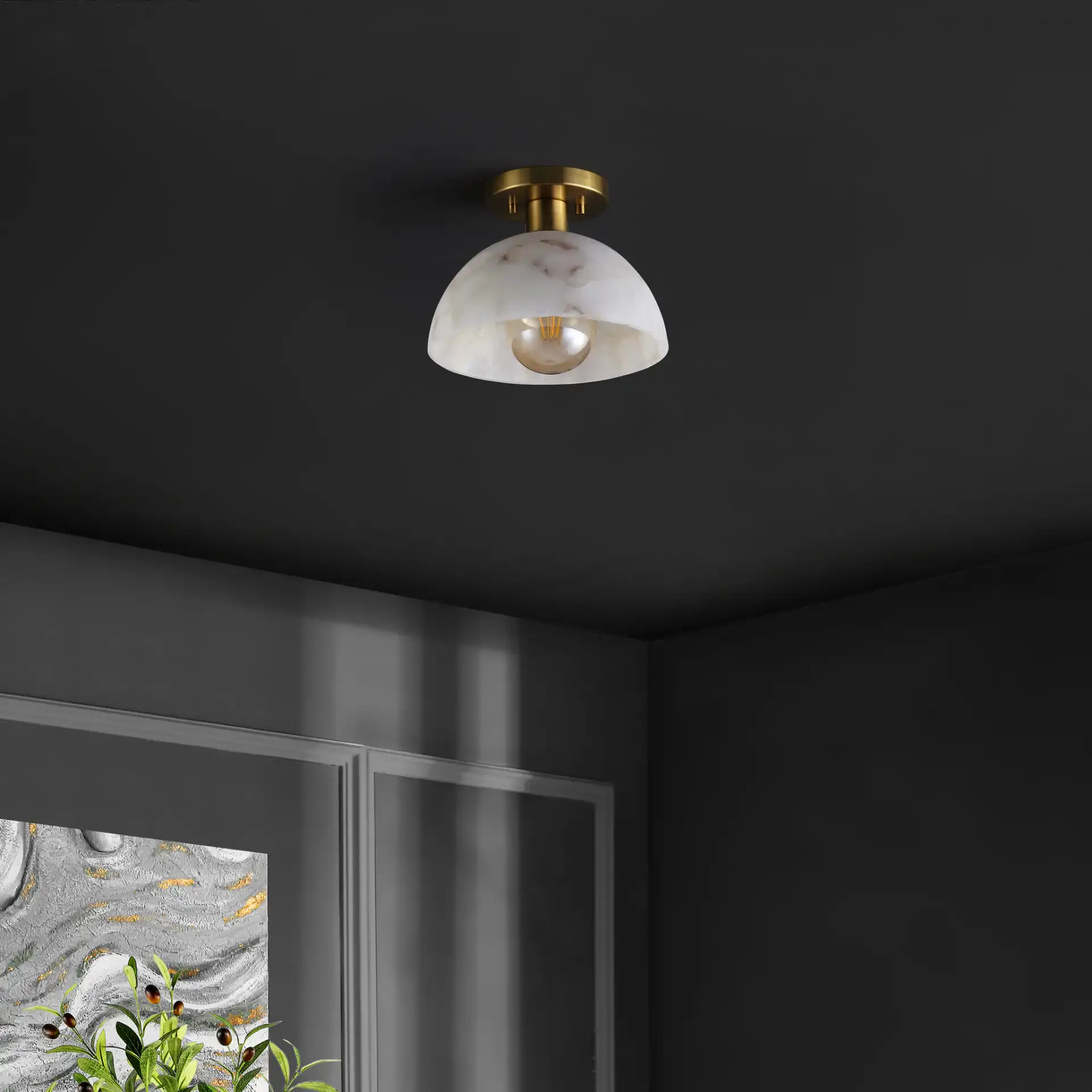 Arue Flush Mount in White / Brass in a styled room