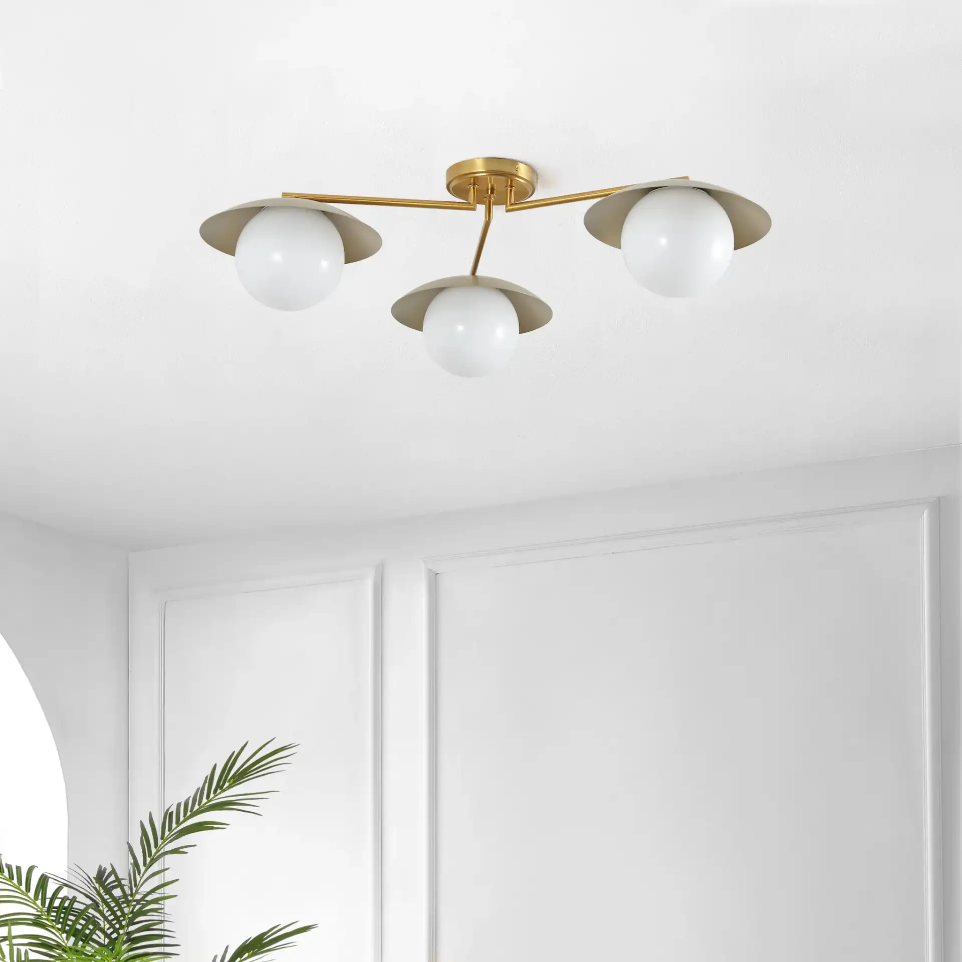 Kylo Flush Mount in Brass in a styled room