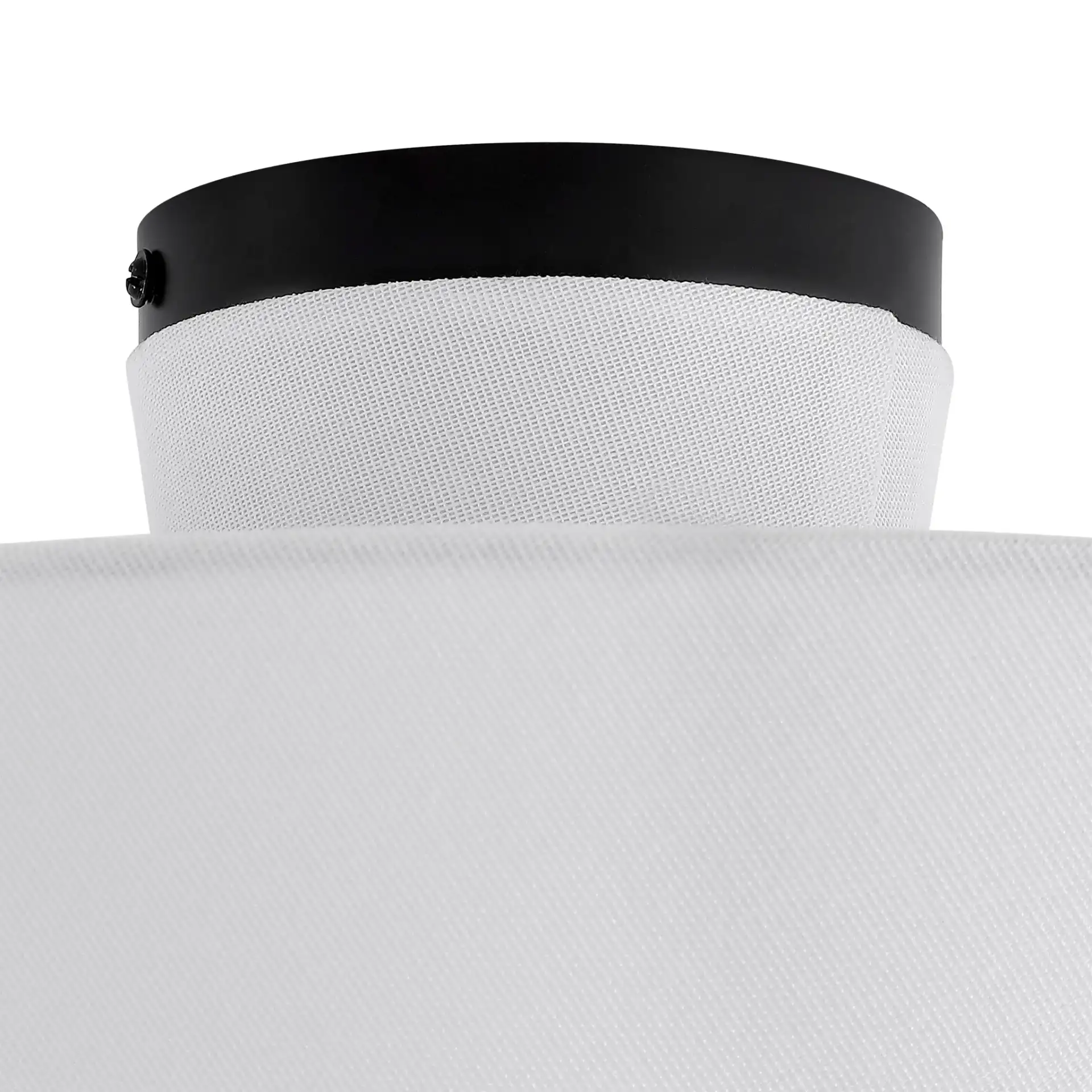 Oisten 18" Flush Mount Light in White / Black in a styled room