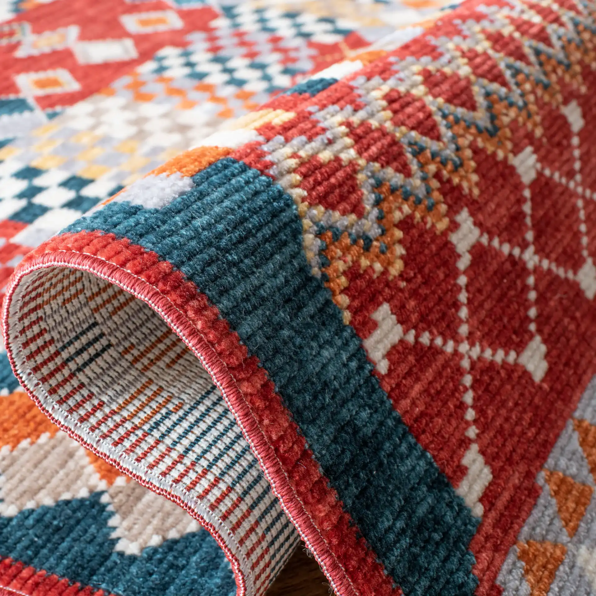 Farmhouse Patchwork Rug in Navy / Red in a styled room