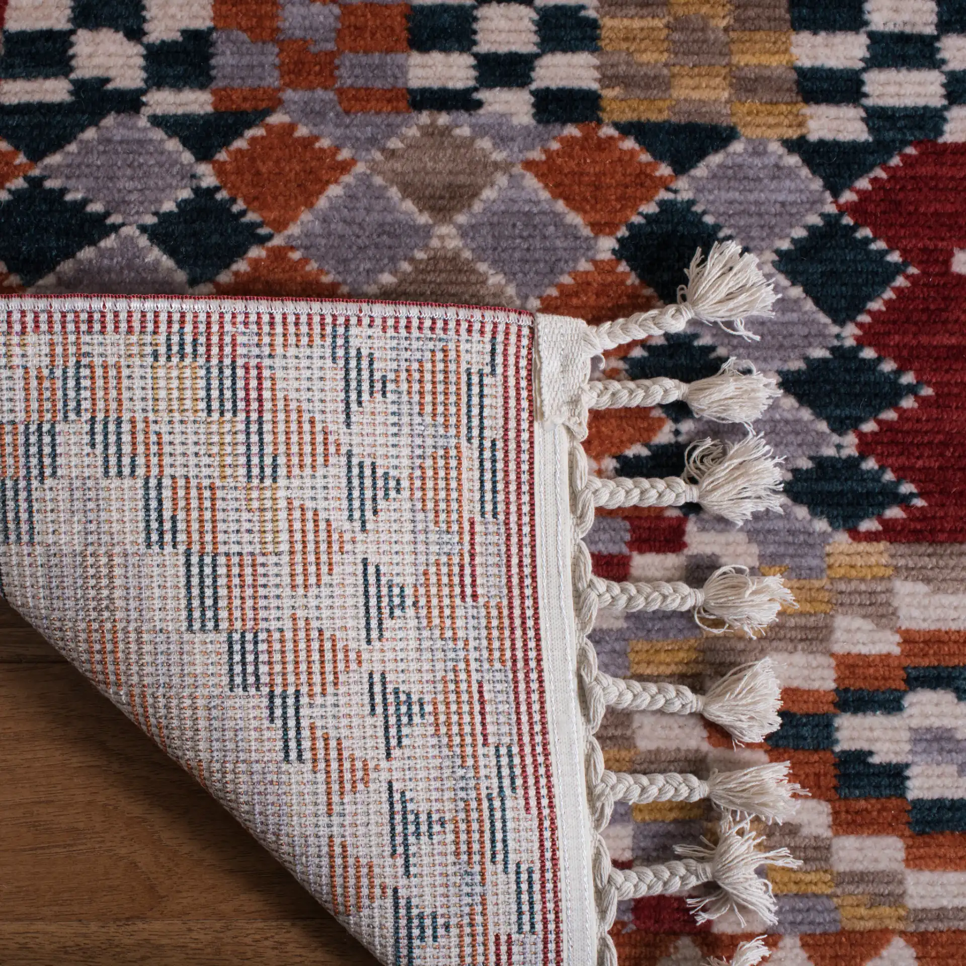 Farmhouse Patchwork Rug in Navy / Red in a styled room