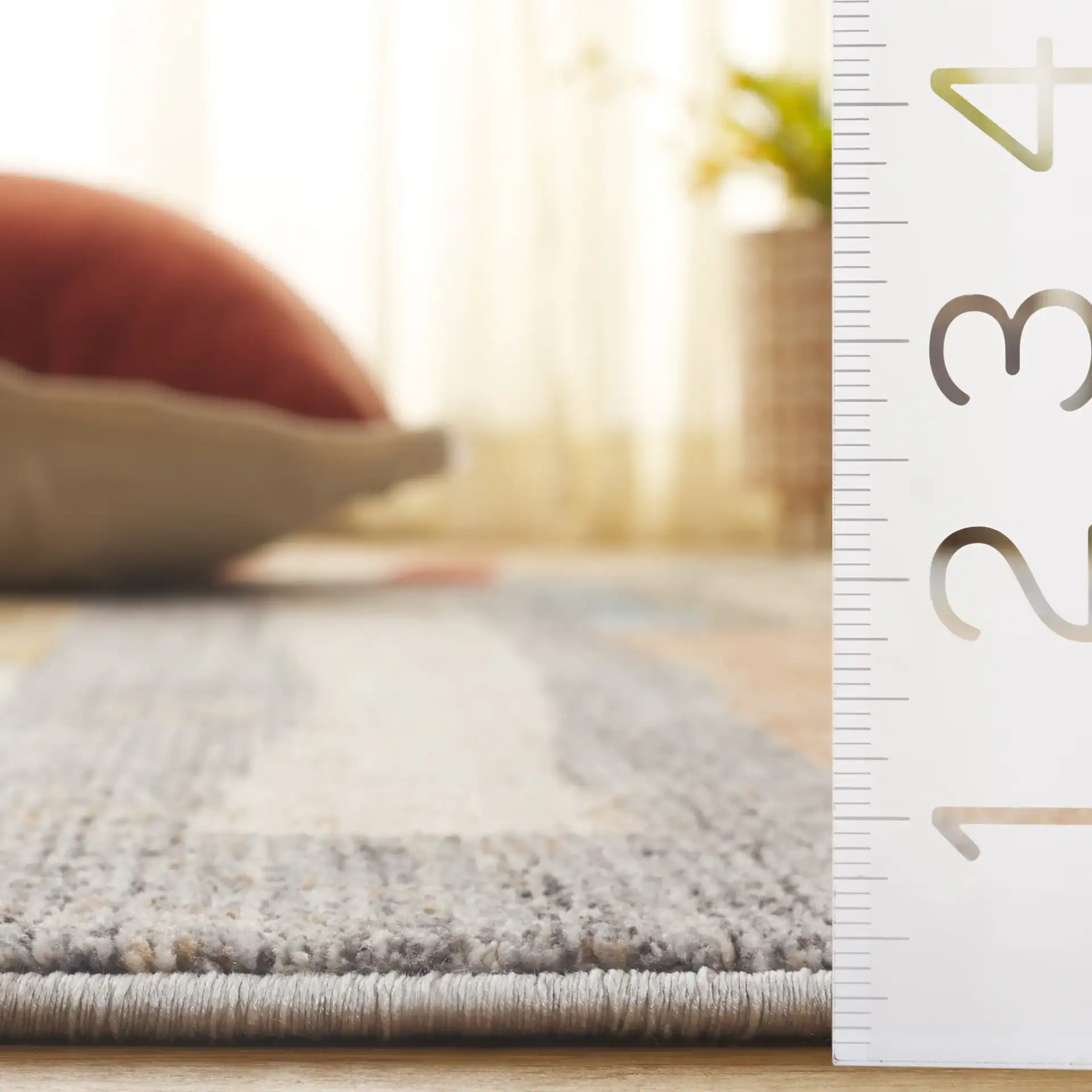 Forum Staggered Block Rug in Rust / Blue Gray in a styled room