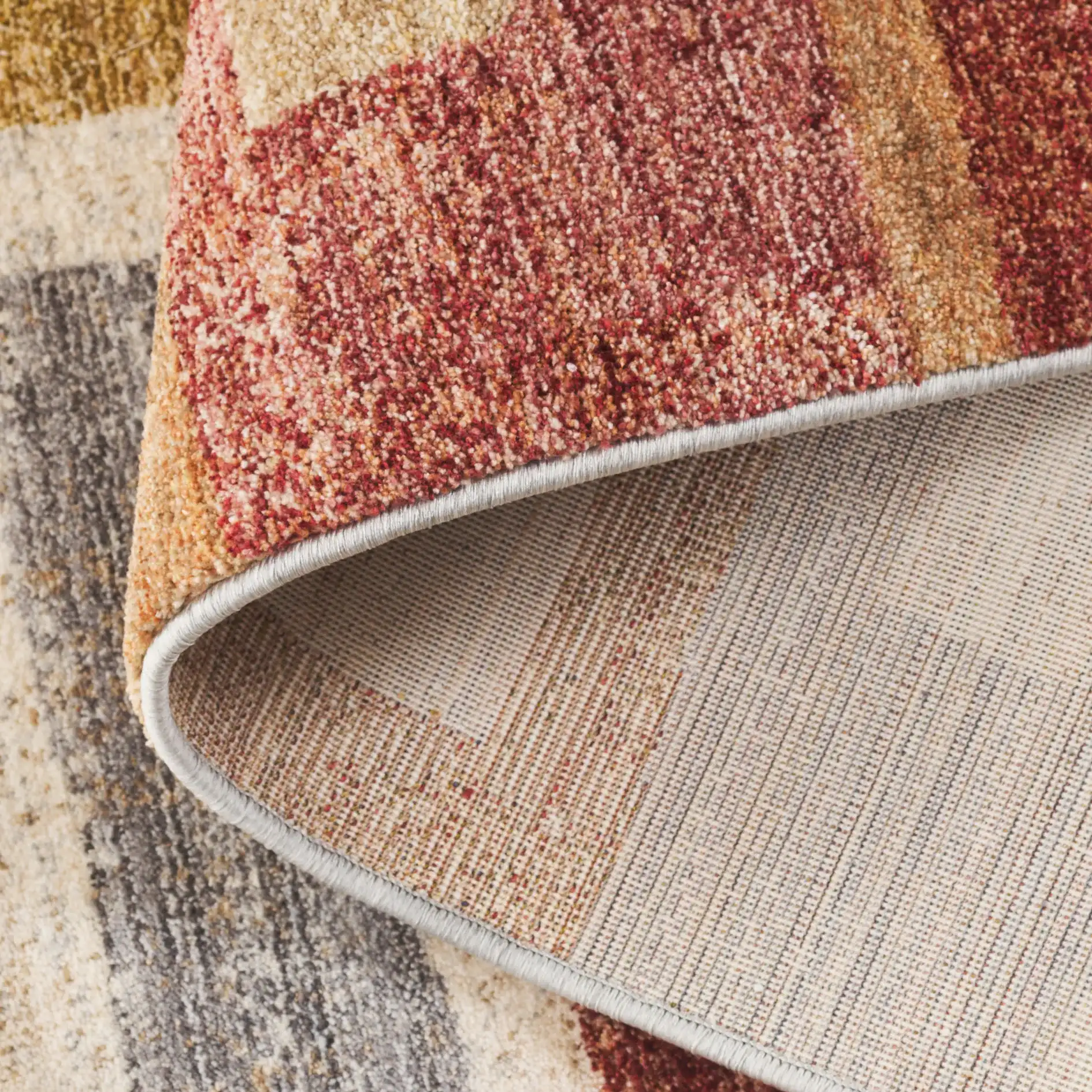 Forum Staggered Block Rug in Rust / Blue Gray in a styled room