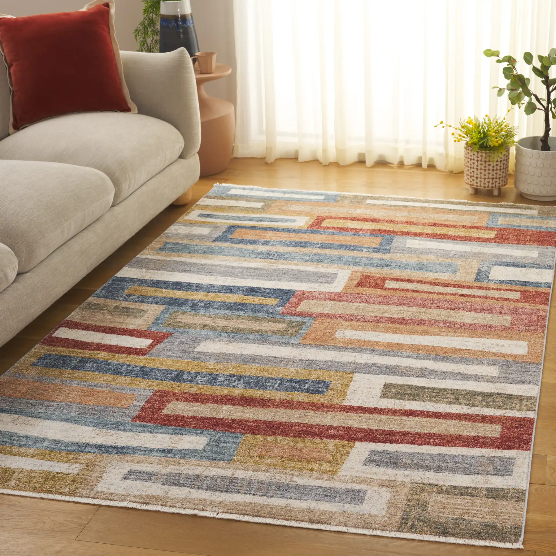 Forum Staggered Block Rug in Rust / Blue Gray in a styled room