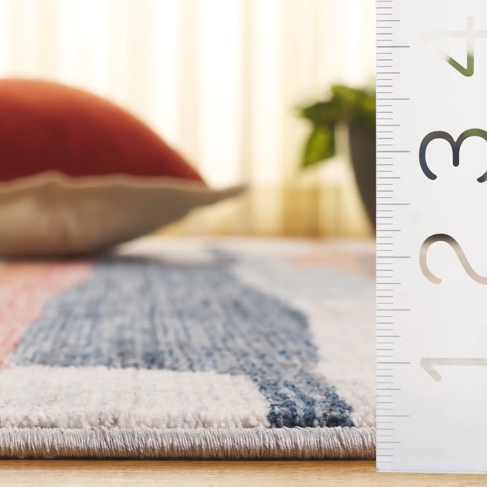 Forum Abstract Stripe Rug in Ivory / Rust Blue in a styled room