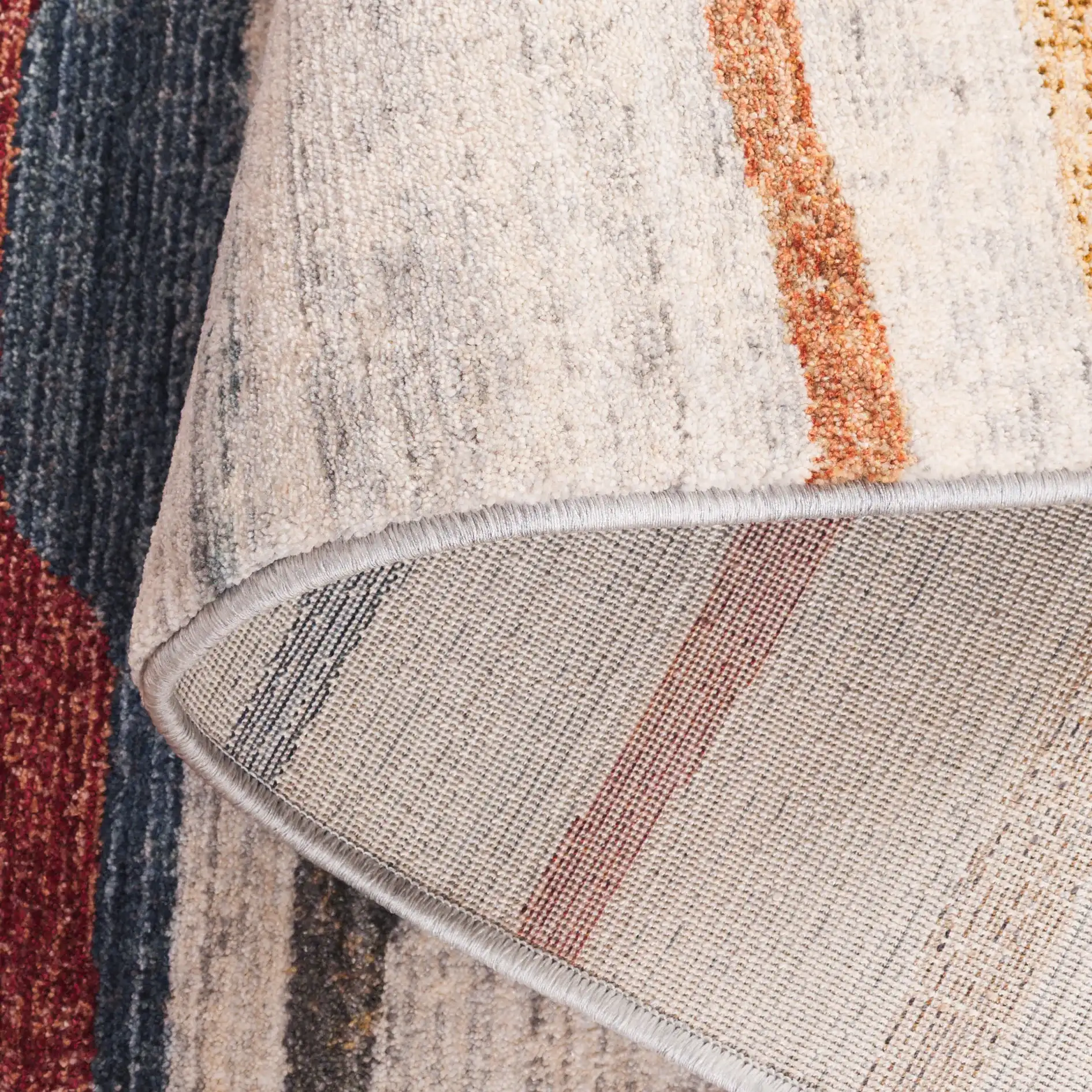 Forum Abstract Stripe Rug in Ivory / Rust Blue in a styled room