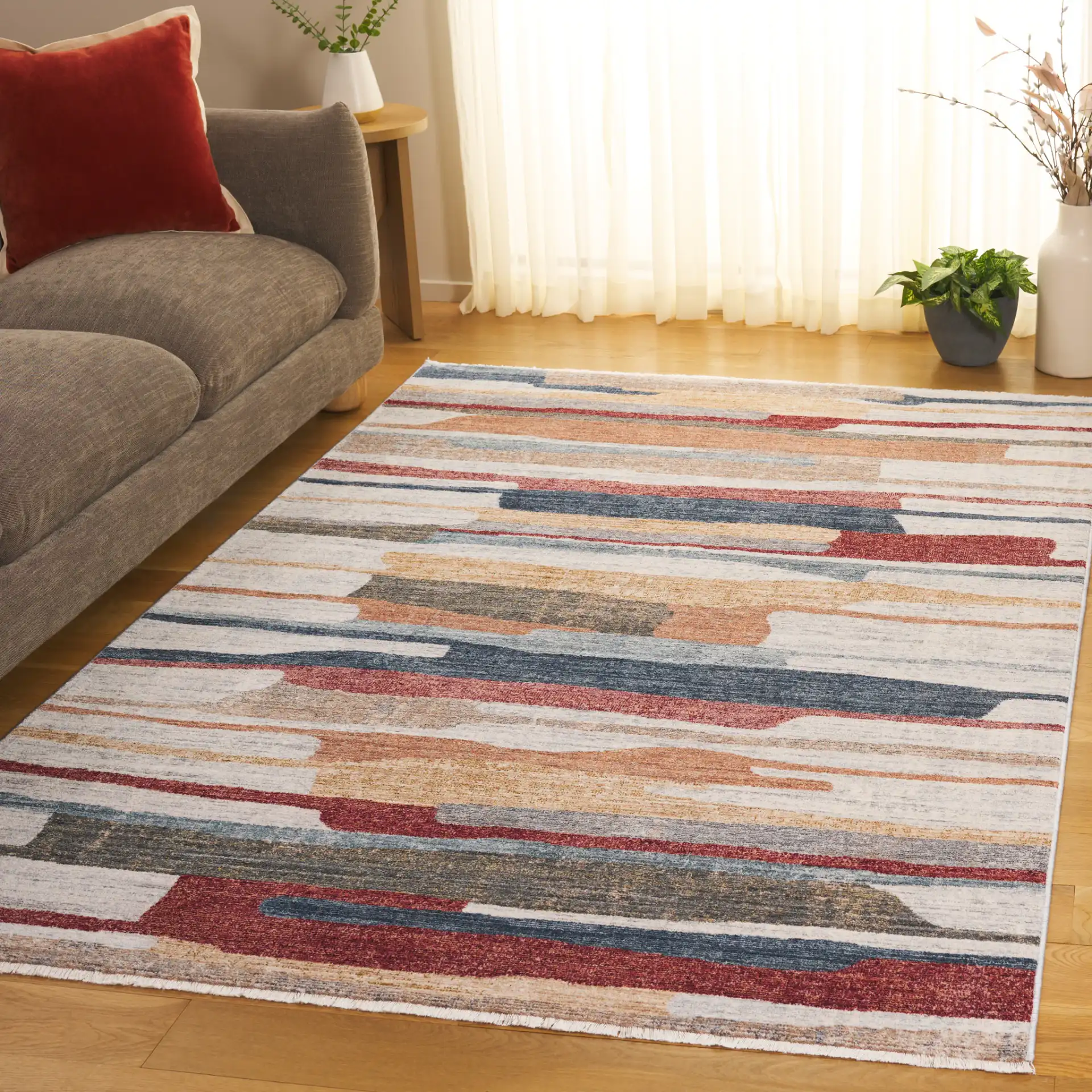Forum Abstract Stripe Rug in Ivory / Rust Blue in a styled room