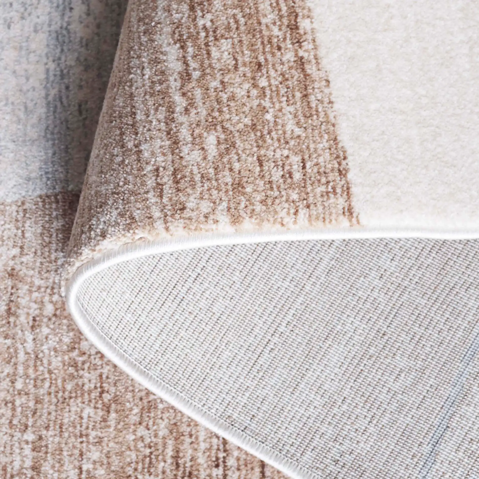 Forum Modern Abstract Rug in Ivory / Gray Brown in a styled room